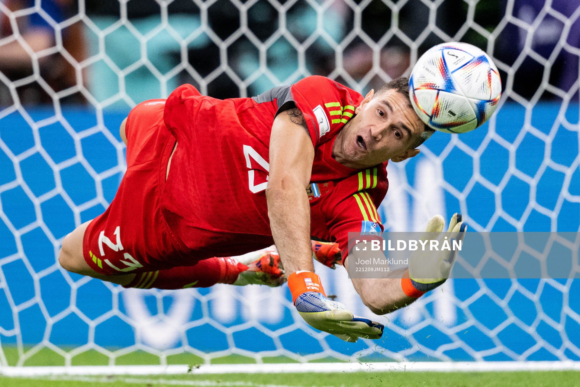 Goalkeeper Emiliano Martinez of Argentina saves