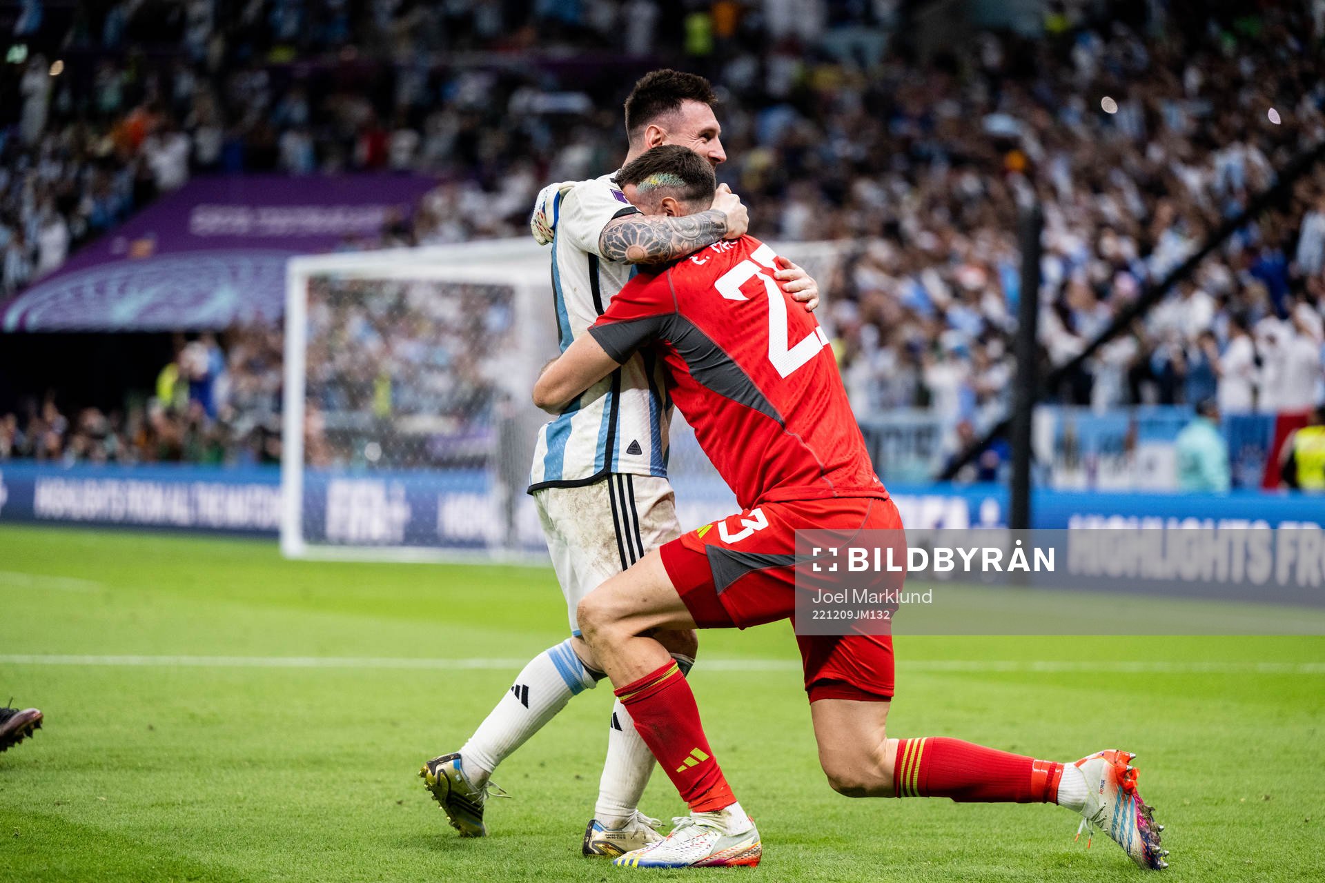 Lionel Messi and goalkeeper Emiliano Martinez of Argentina