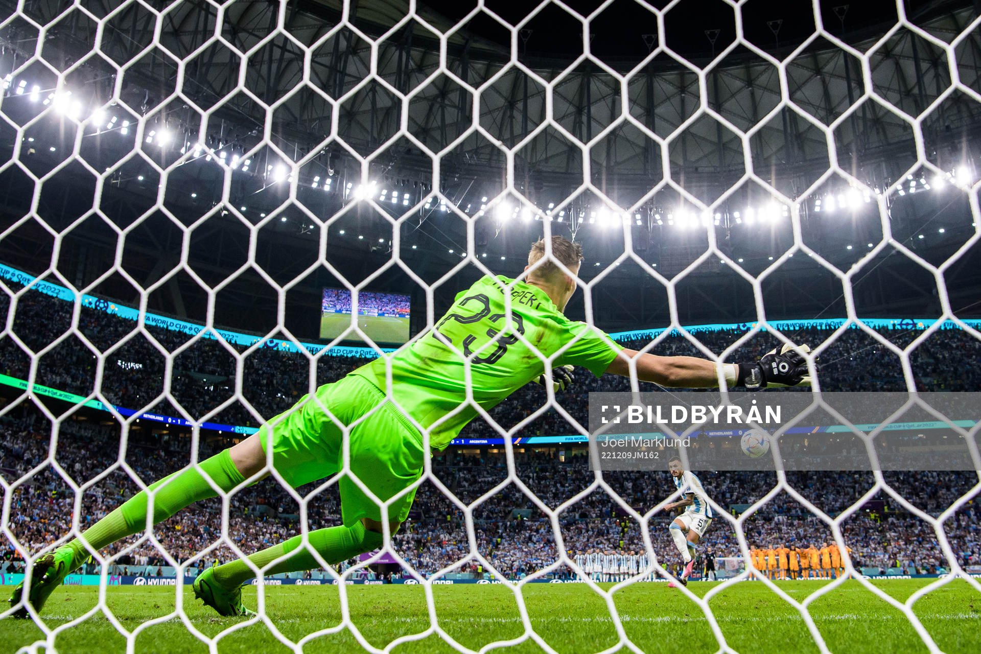 Leandro Paredes of Argentina scores at penalty shootout