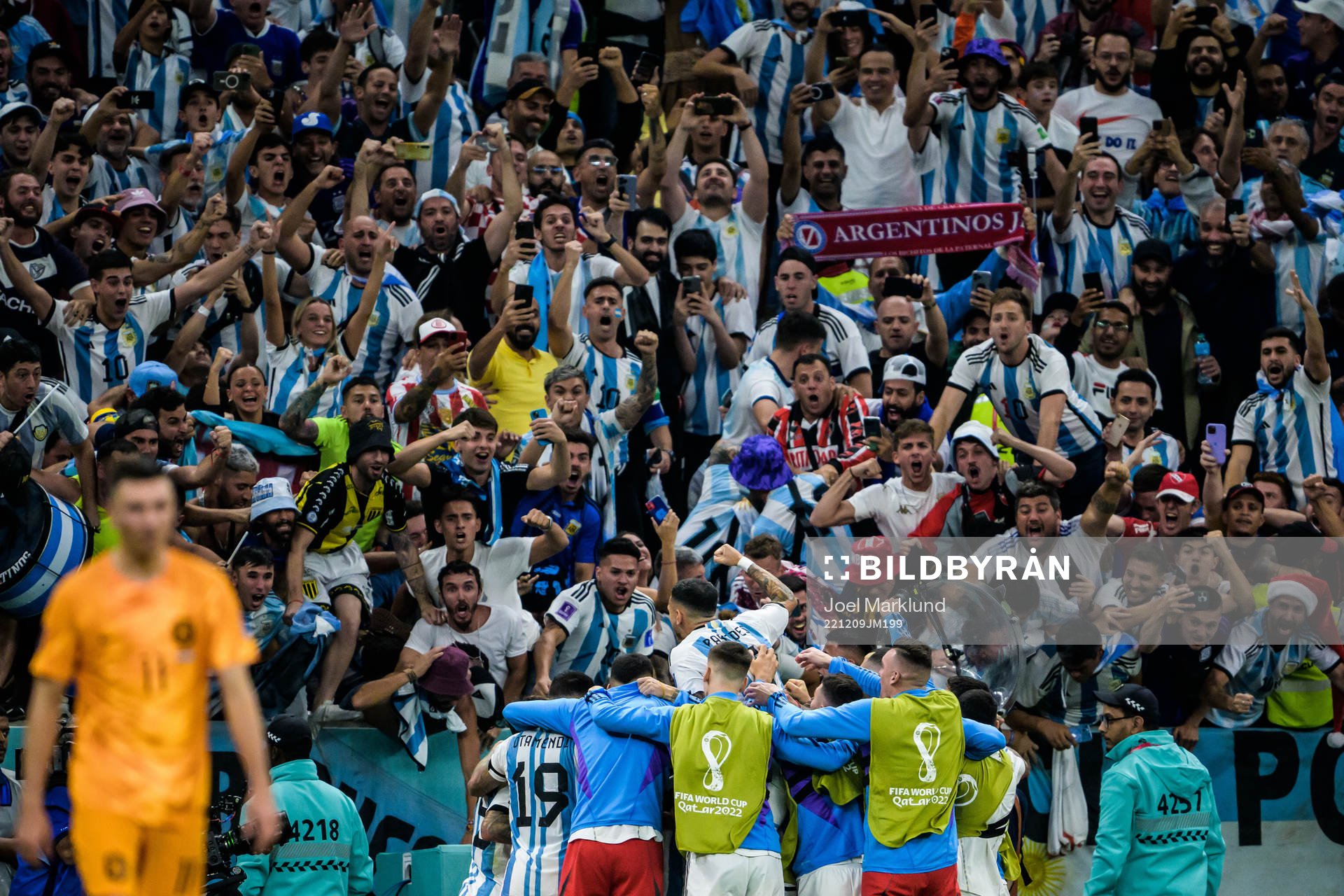 Players of Argentina celebrate the 0-2 goal by Lionel Messi