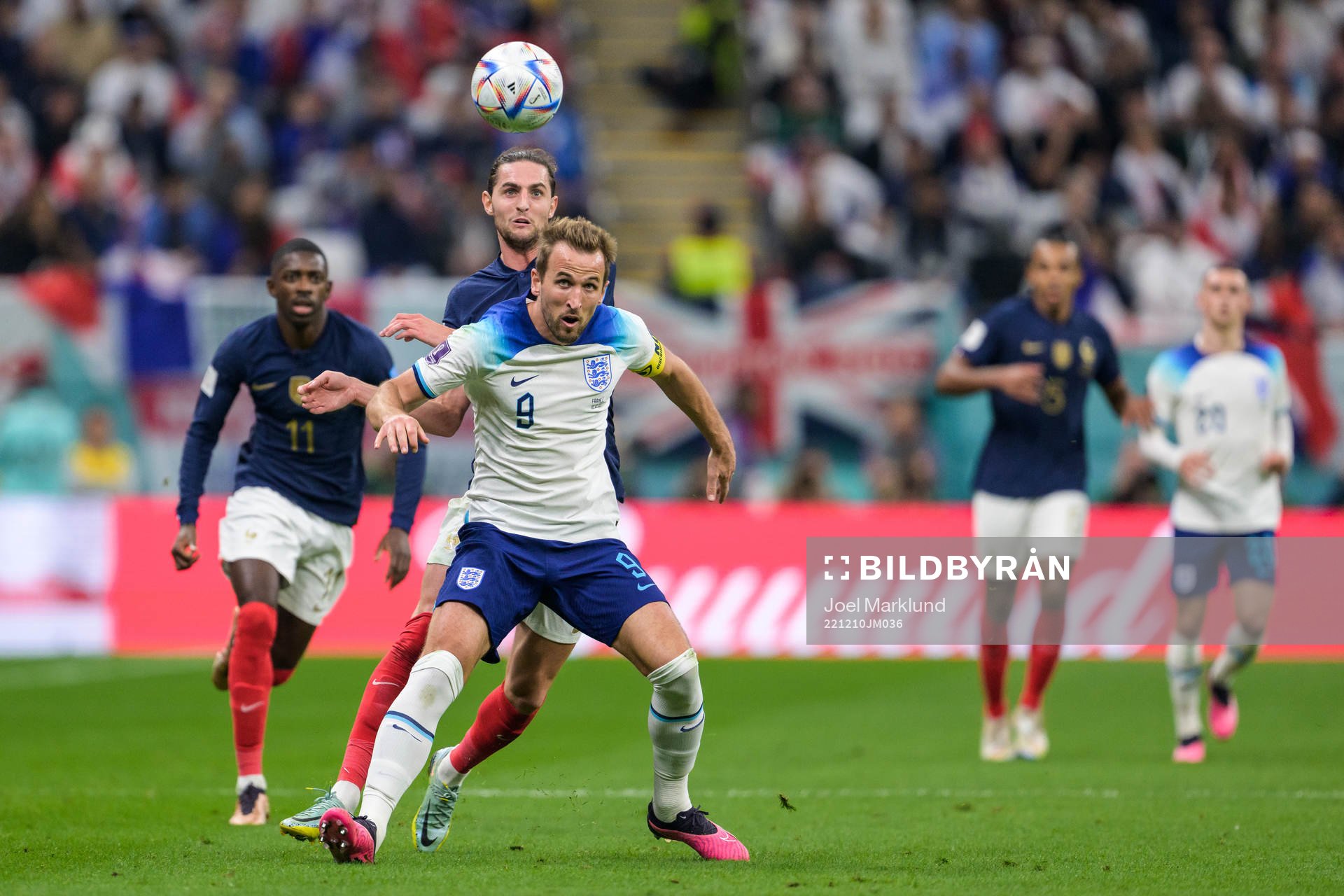Adrien Rabiot of France and Harry Kane of England
