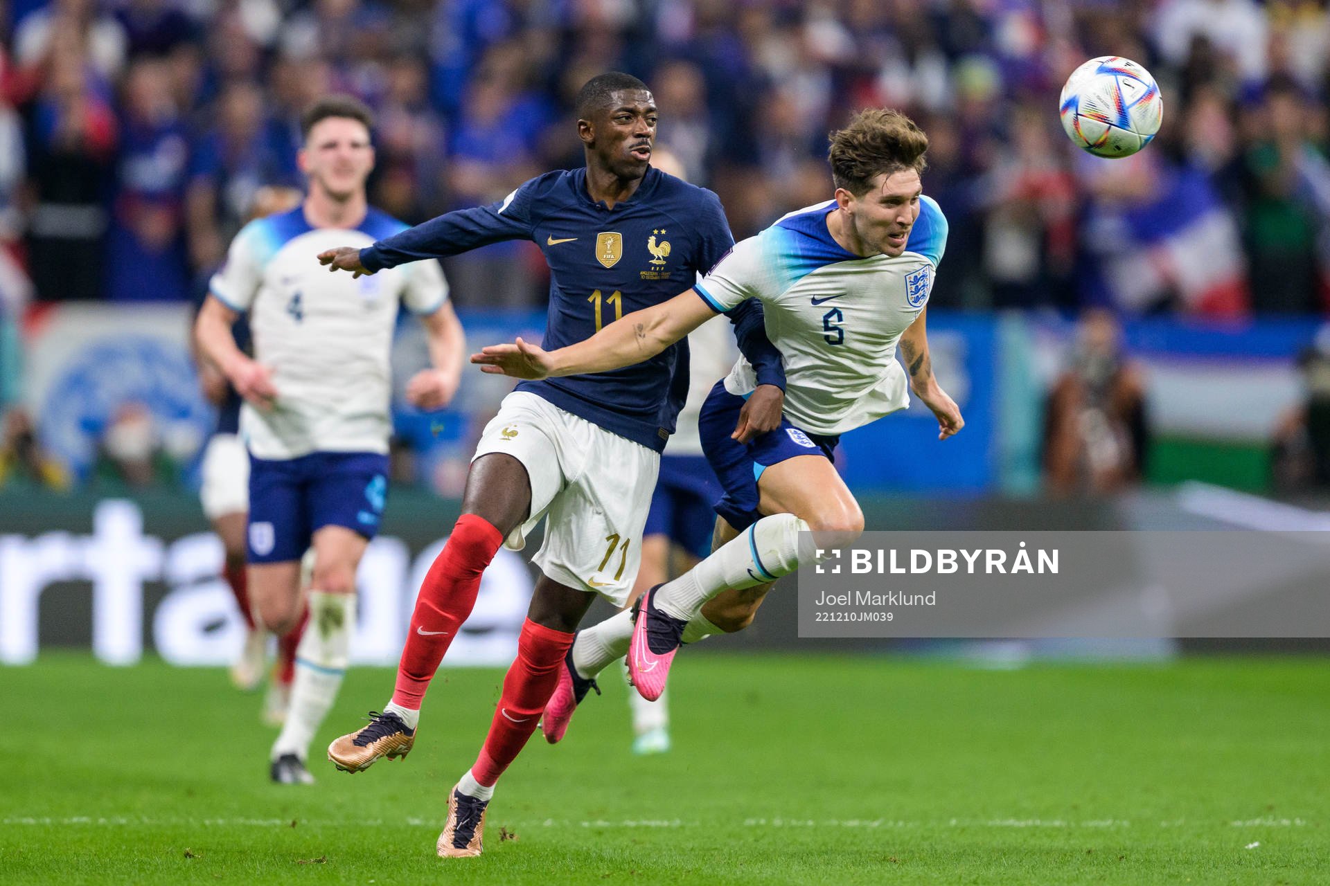 Ousmane Dembele of France and John Stones of England