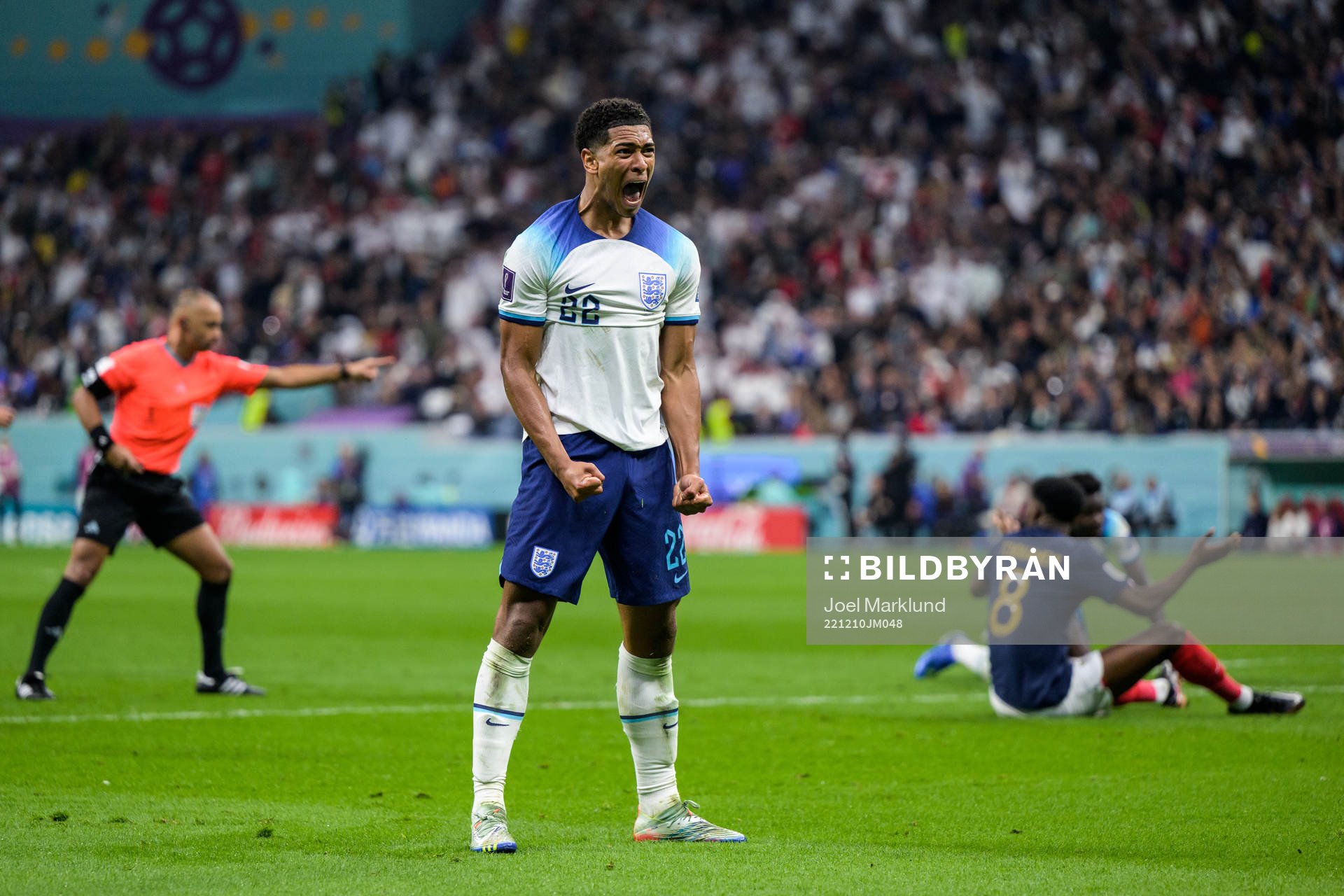 Jude Bellingham of England celebrates as England is
