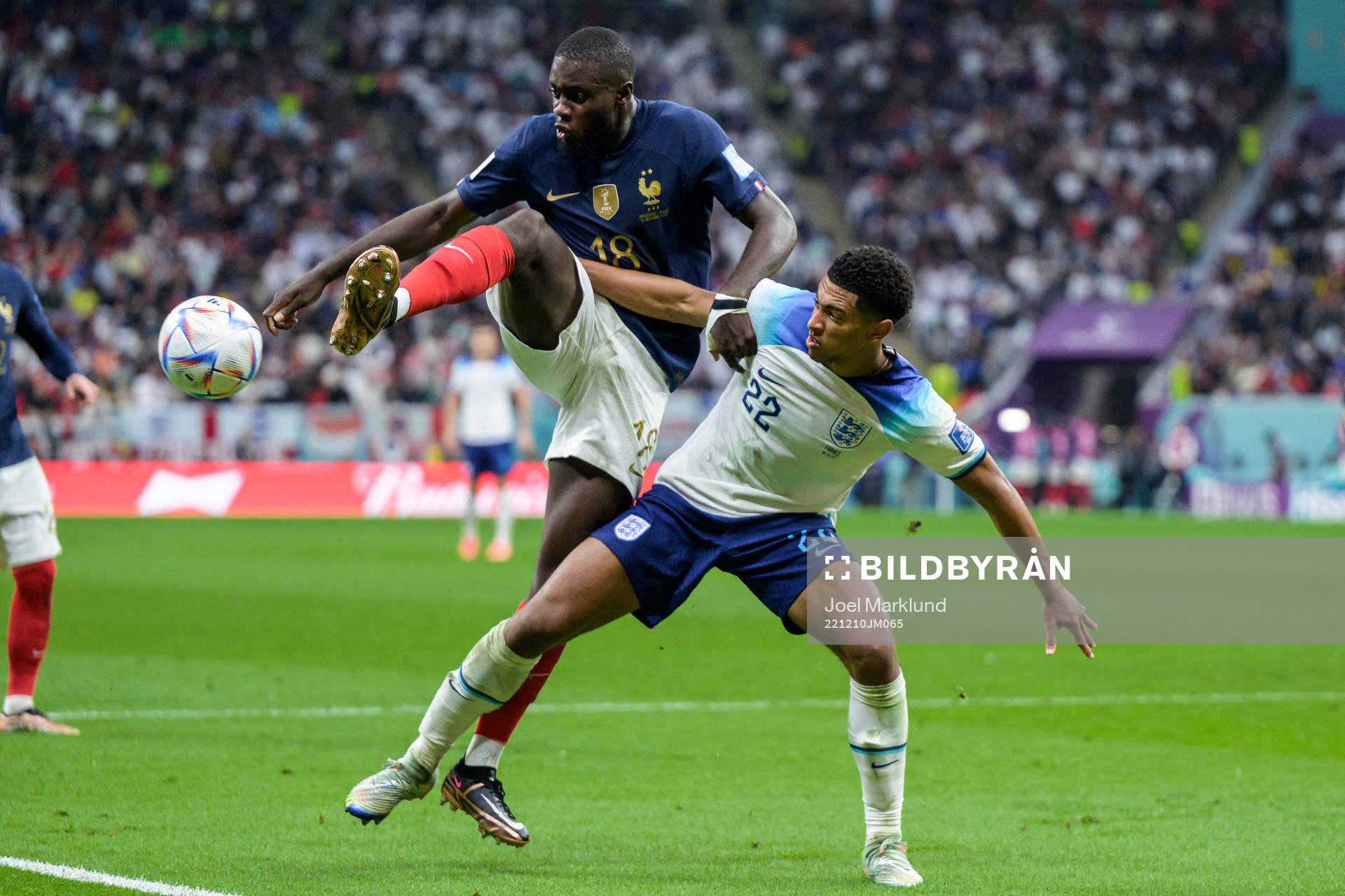 Dayot Upamecano of France and Jude Bellingham of England