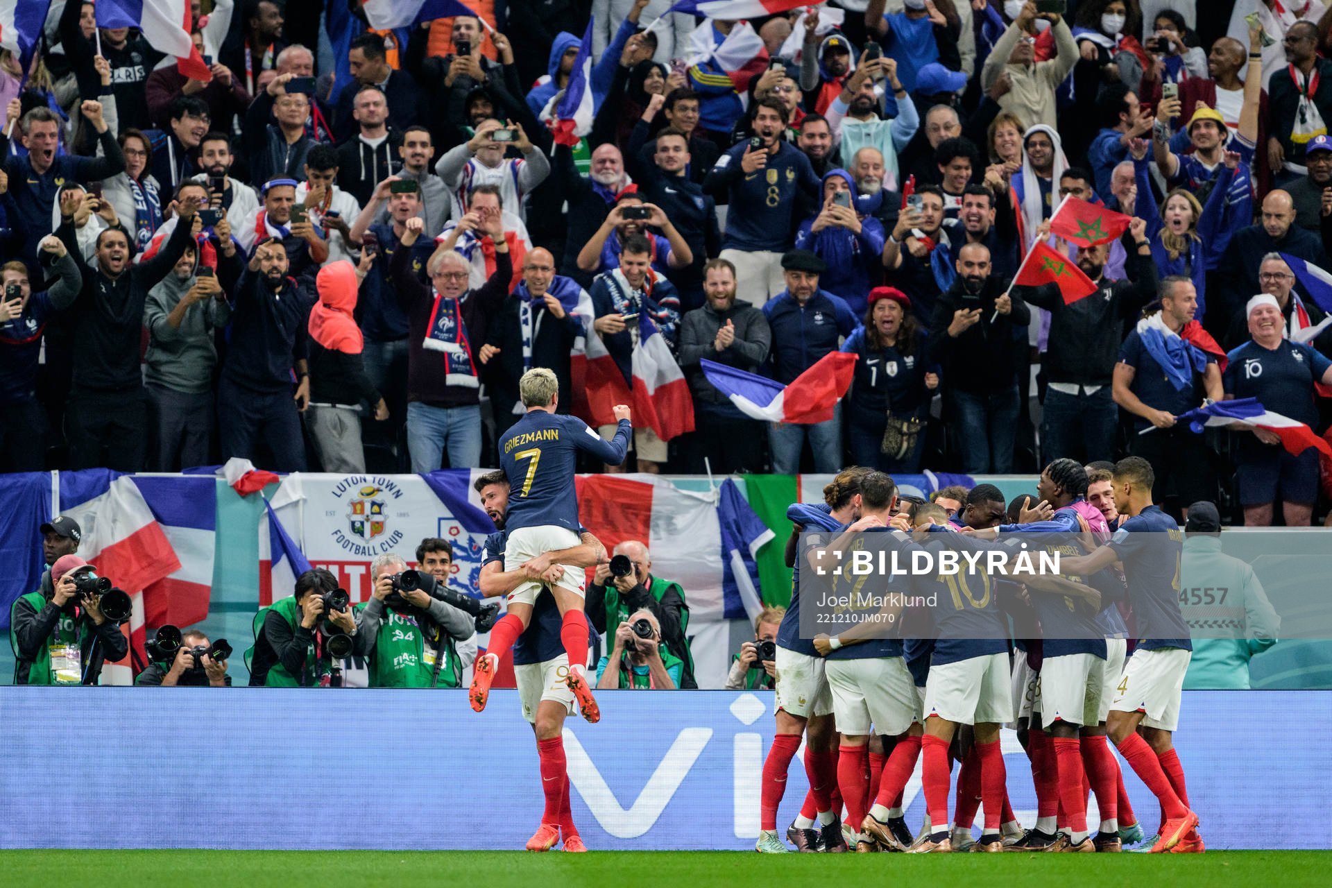 Olivier Giroud and Antoine Griezmann of France celebrate
