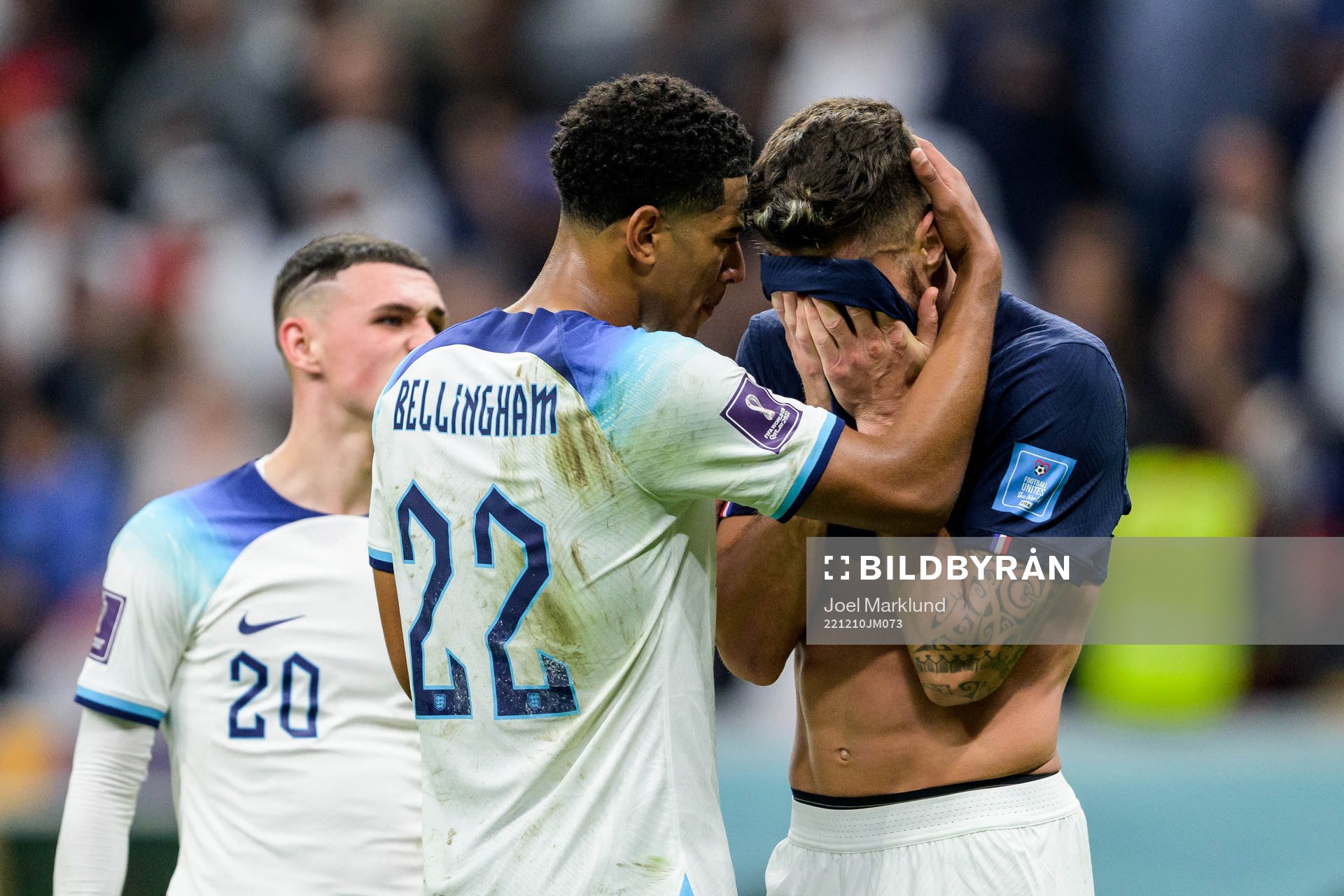 Jude Bellingham of England and Olivier Giroud of France