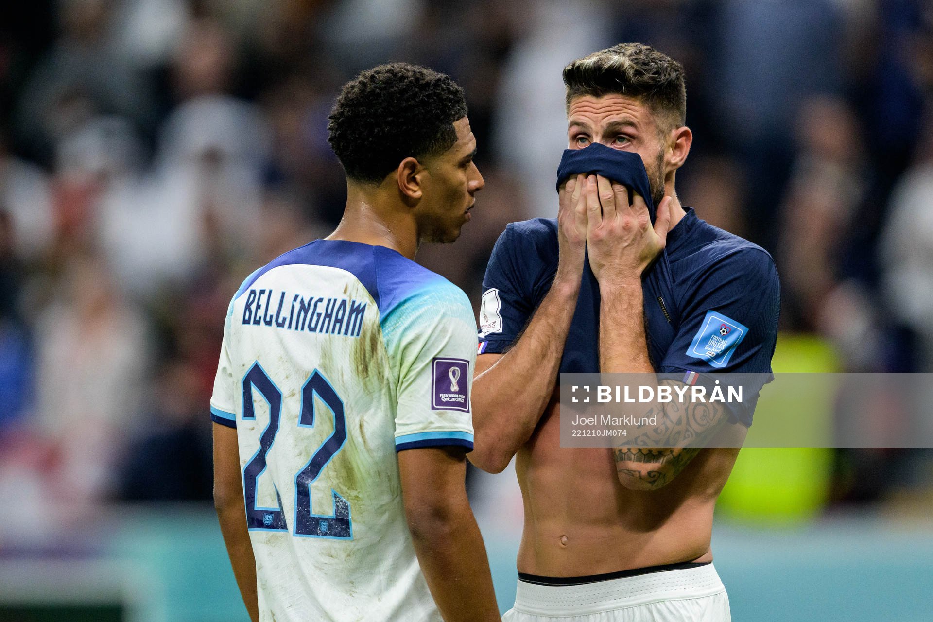 Jude Bellingham of England and Olivier Giroud of France