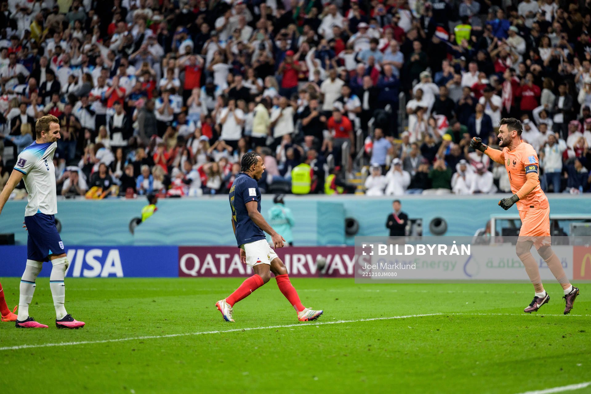 goalkeeper Hugo Lloris and Jules Kounde of France celebrate