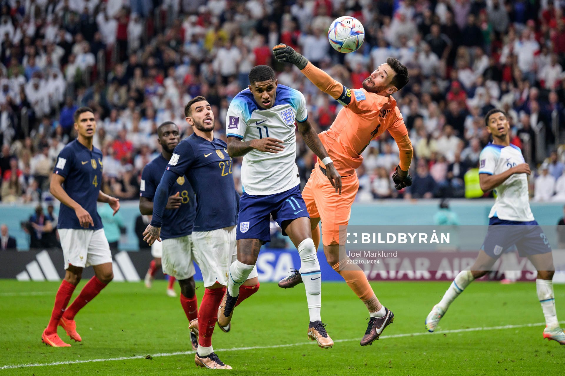 Marcus Rashford of England and goalkeeper Hugo Lloris of