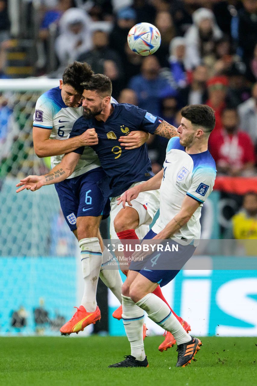 Harry Maguire and Declan Rice of England against Olivier Giroud of France during the FIFA World Cup 2022 quarterfinal between England and France on December 10, 2022 in Doha.