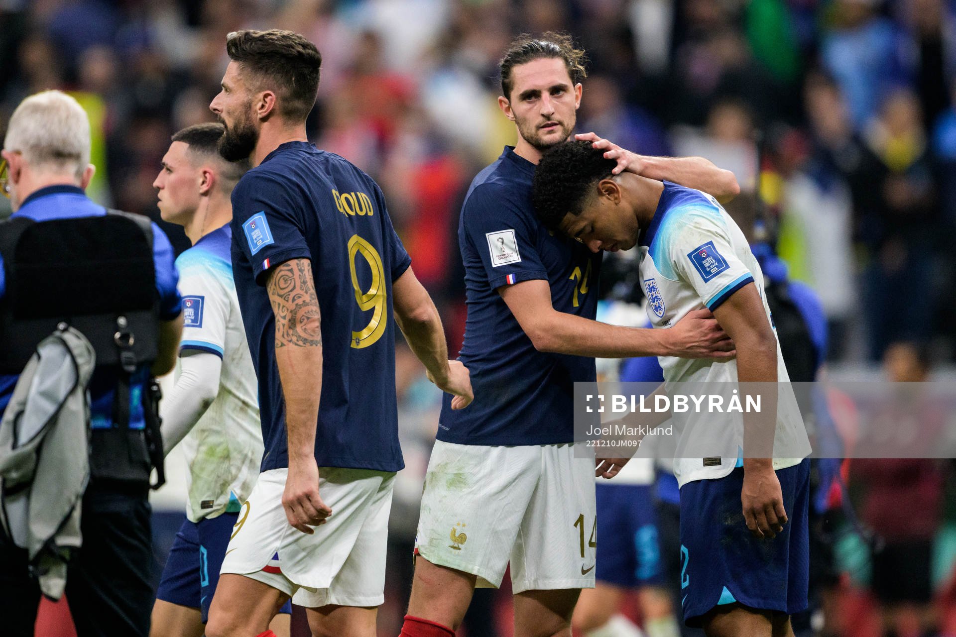 Olivier Giroud and Adrien Rabiot of France with Jude