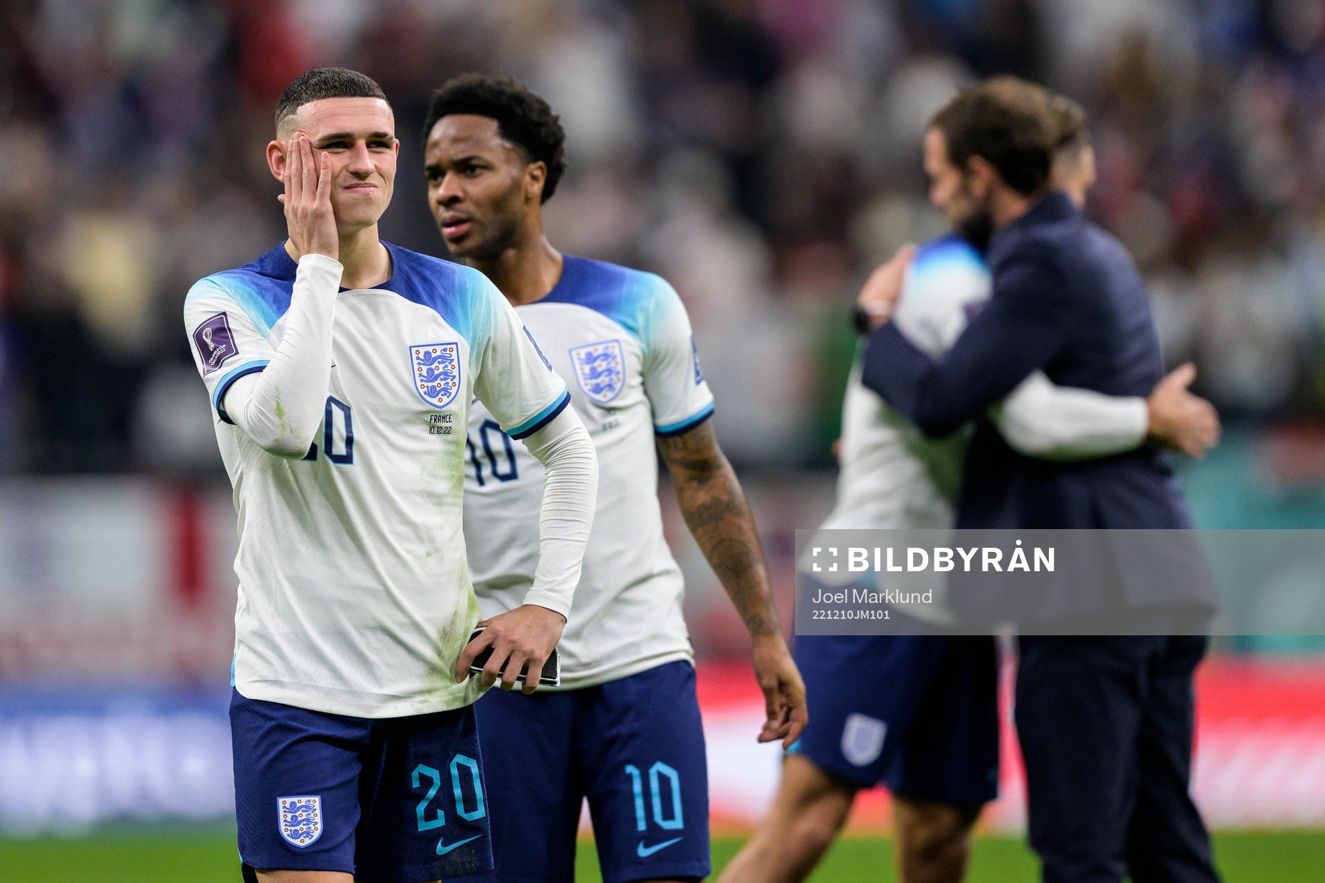 Phil Foden and Raheem Sterling of England