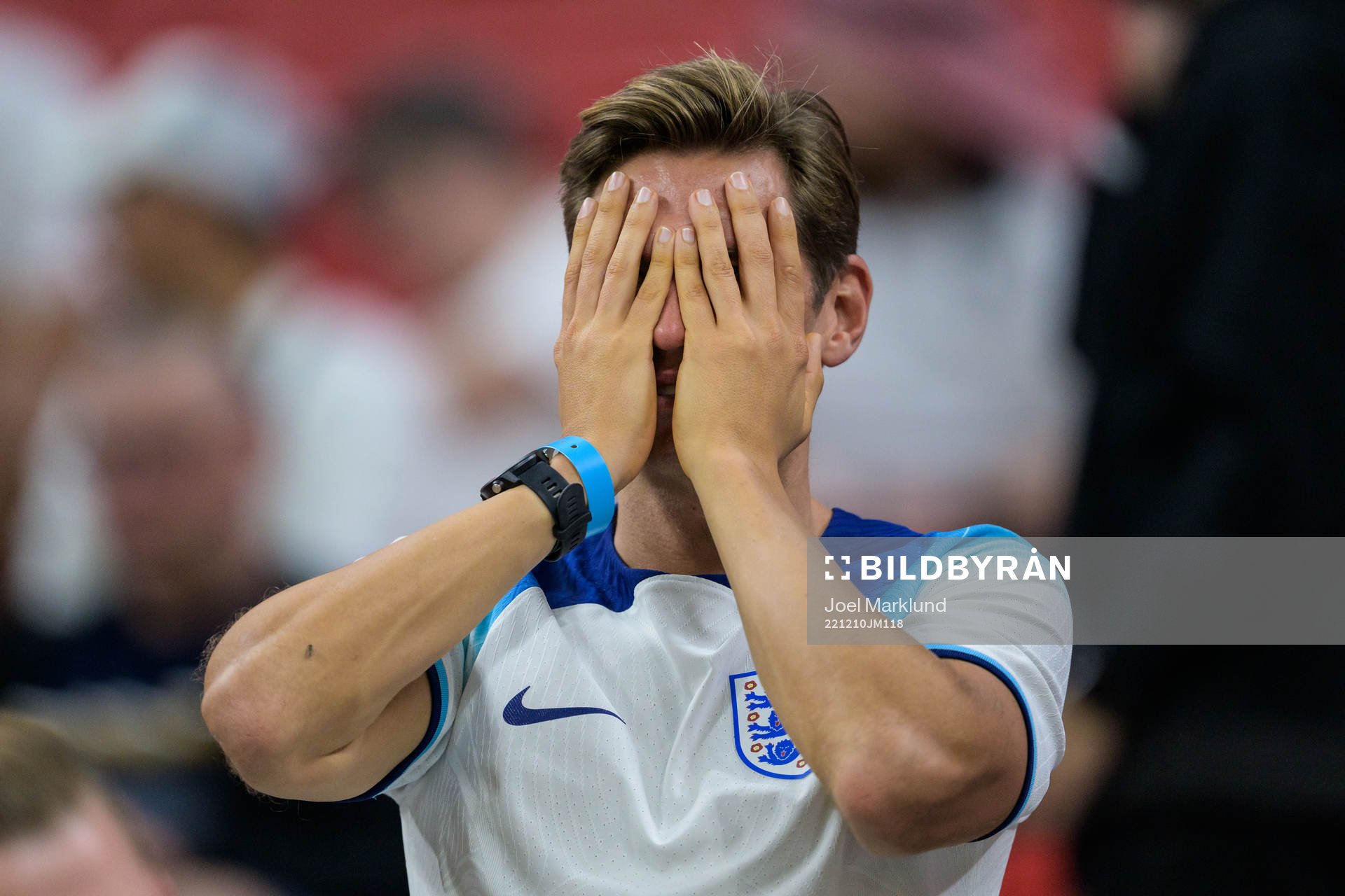 A supporter of England looks dejected