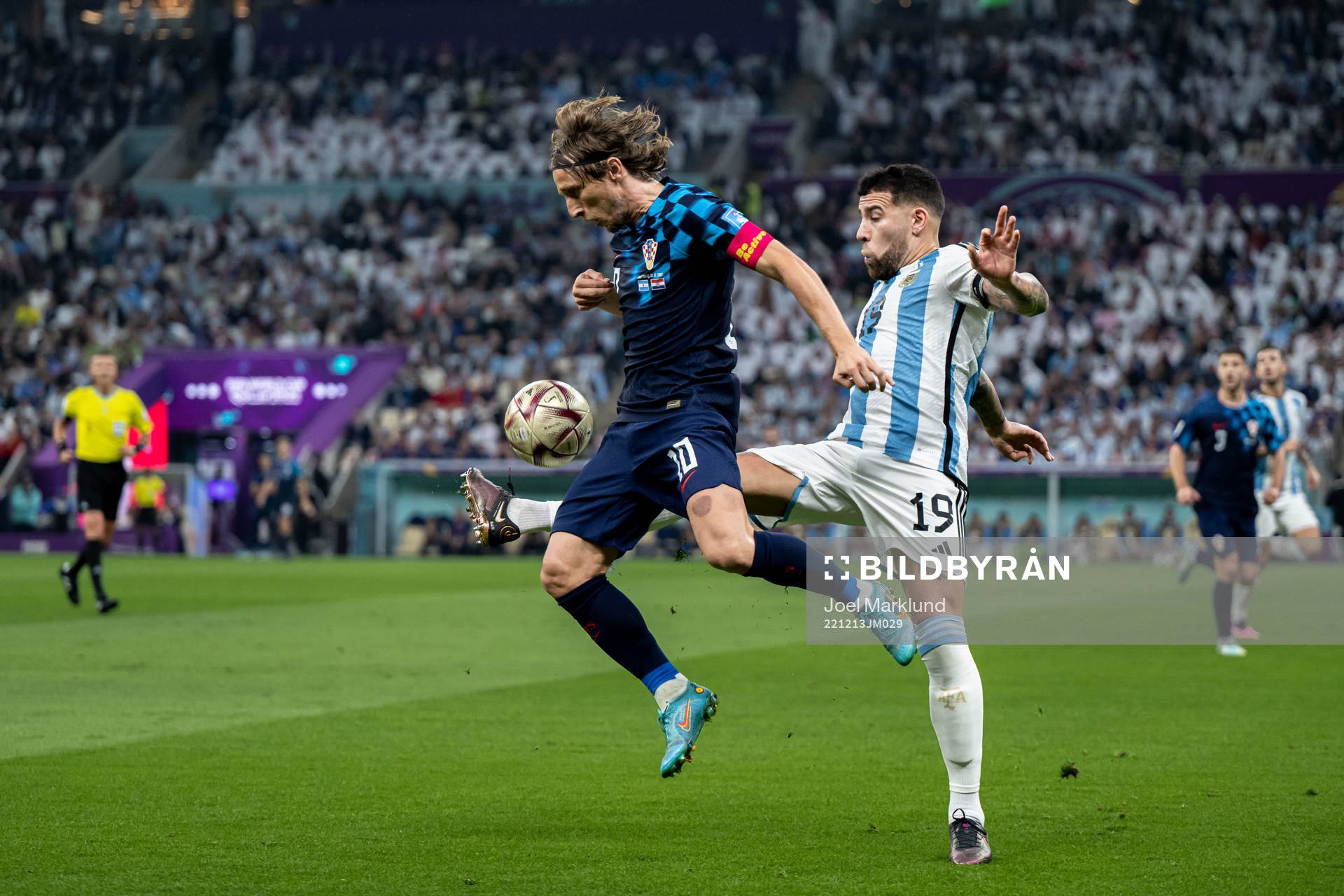 Luka Modric of Croatia and Nicolas Otamendi of Argentina