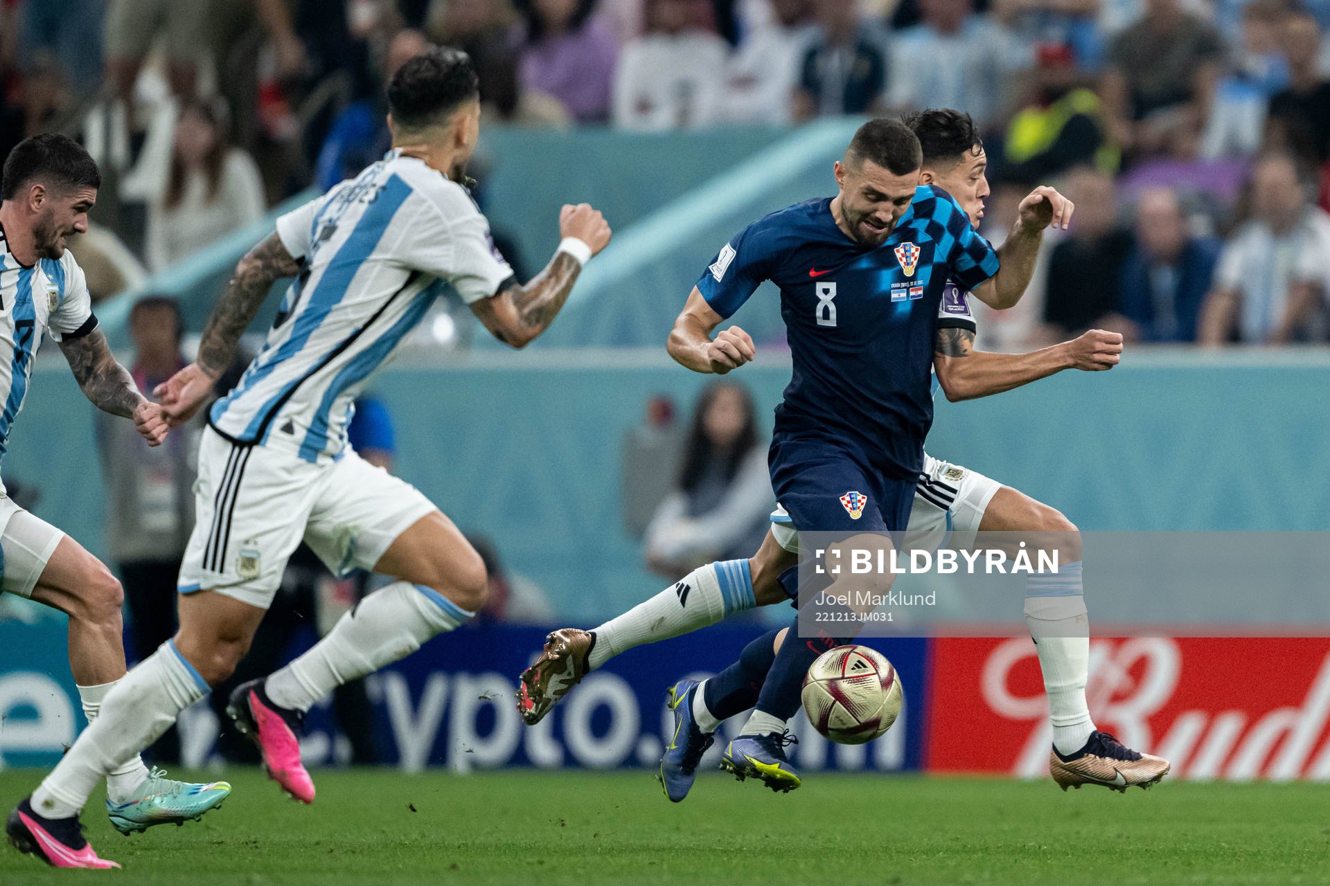 Mateo Kovacic of Croatia and Nahuel Molina of Argentina