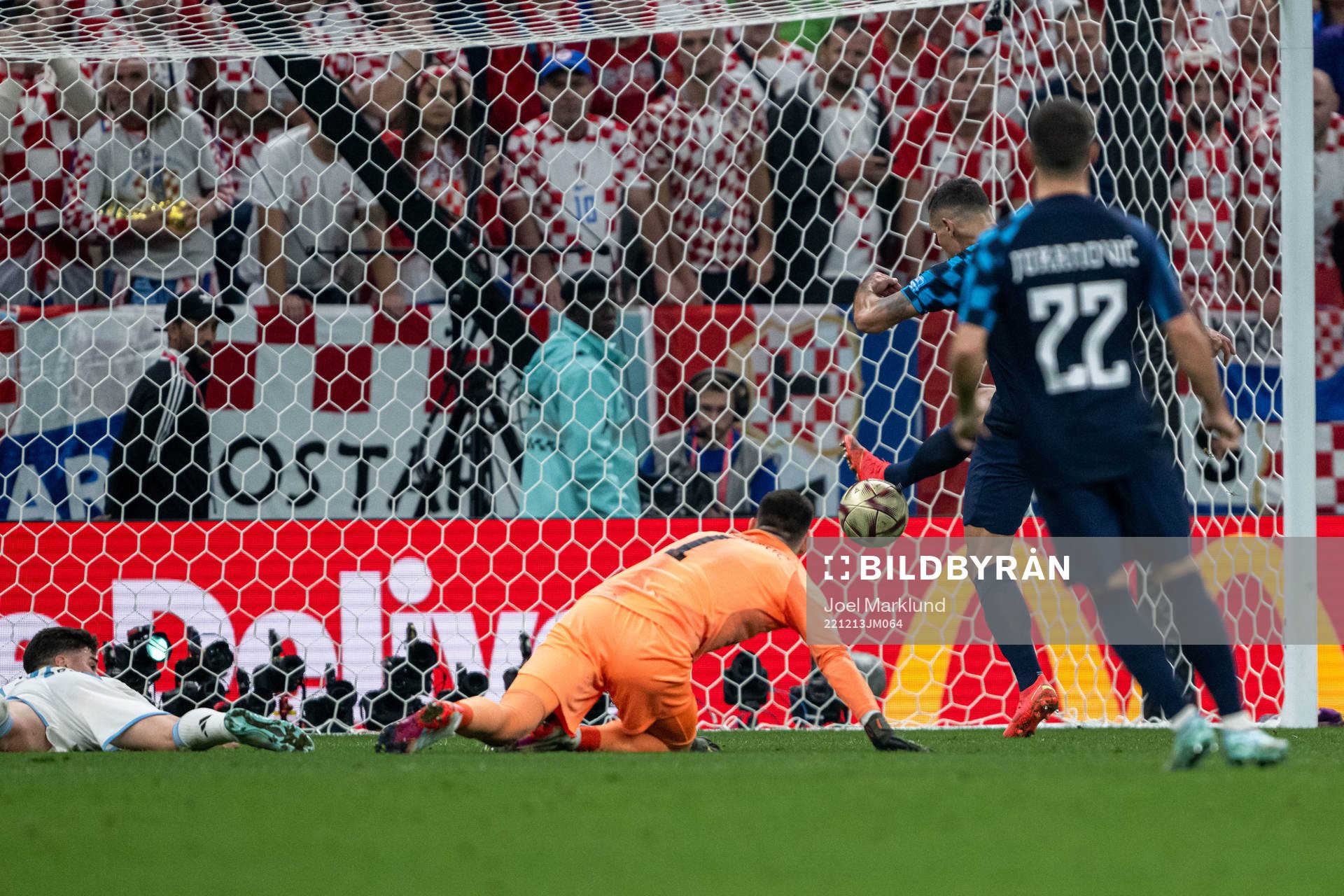 Julian Alvarez of Argentina and goalkeeper Dominik Livakovic of Croatia during the FIFA World Cup 2022 semifinal between Argentina and Croatia on December 13, 2022 in Doha. 