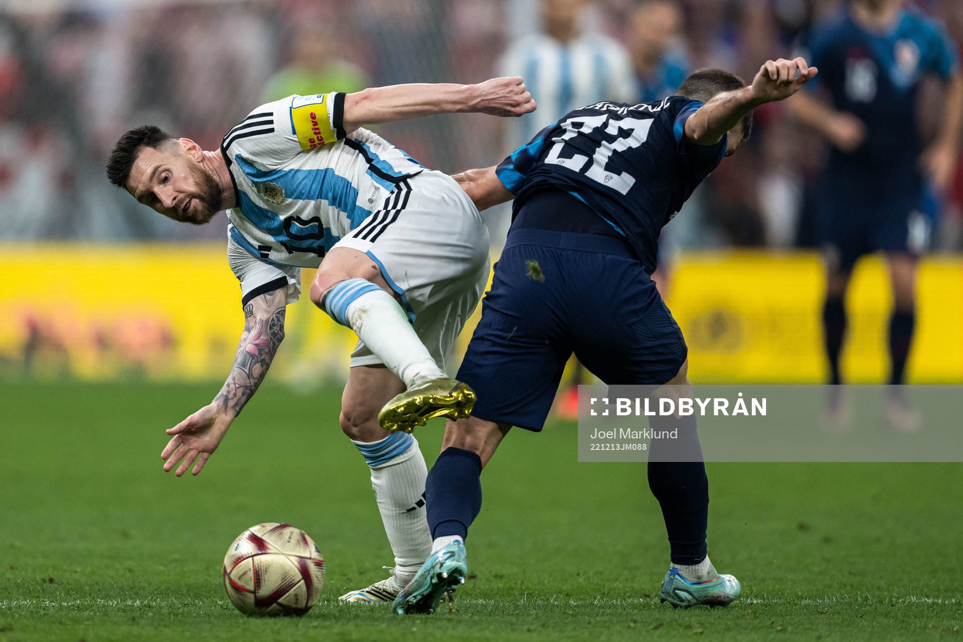 Lionel Messi of Argentina and Josip Juranovic of Croatia during the FIFA World Cup 2022 semifinal between Argentina and Croatia on December 13, 2022 in Doha.