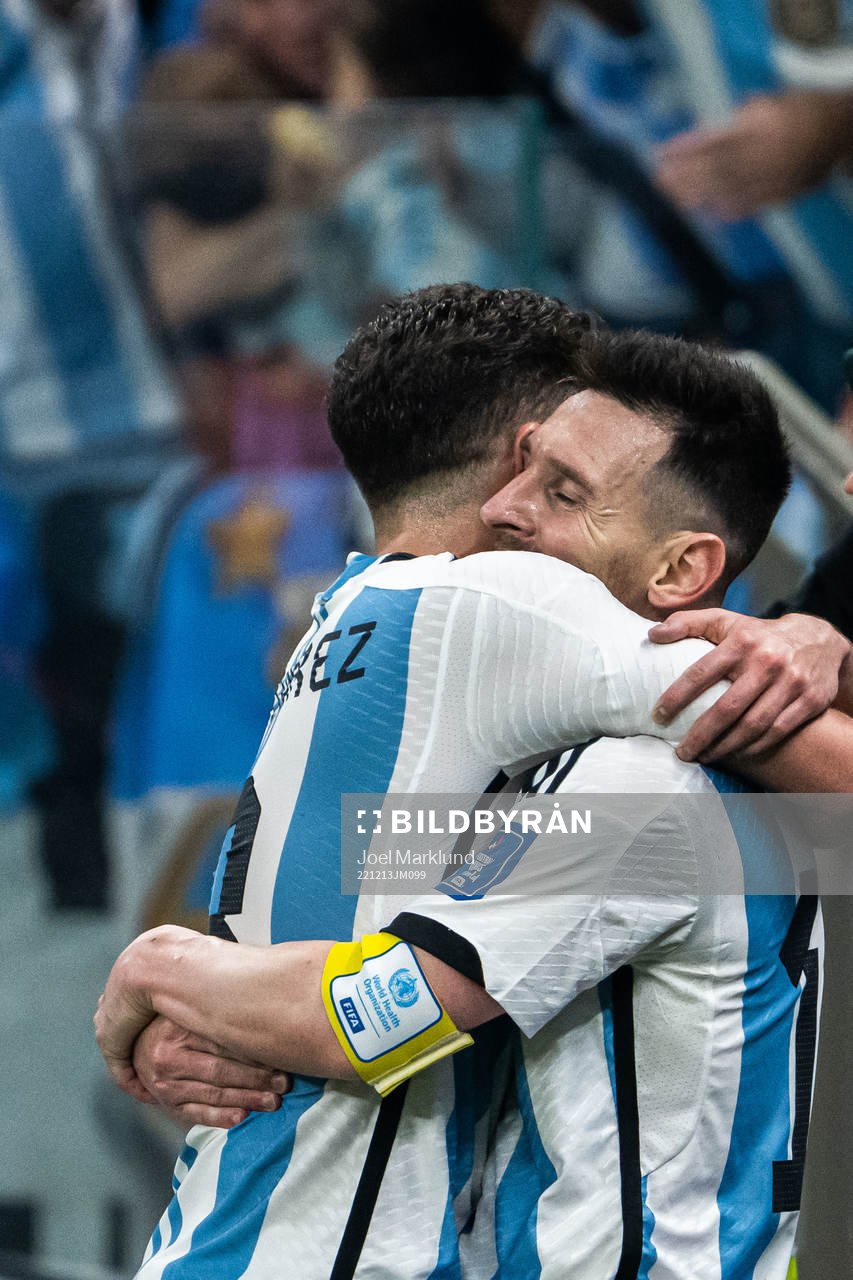 Julian Alvarez and Lionel Messi of Argentina celebrate the