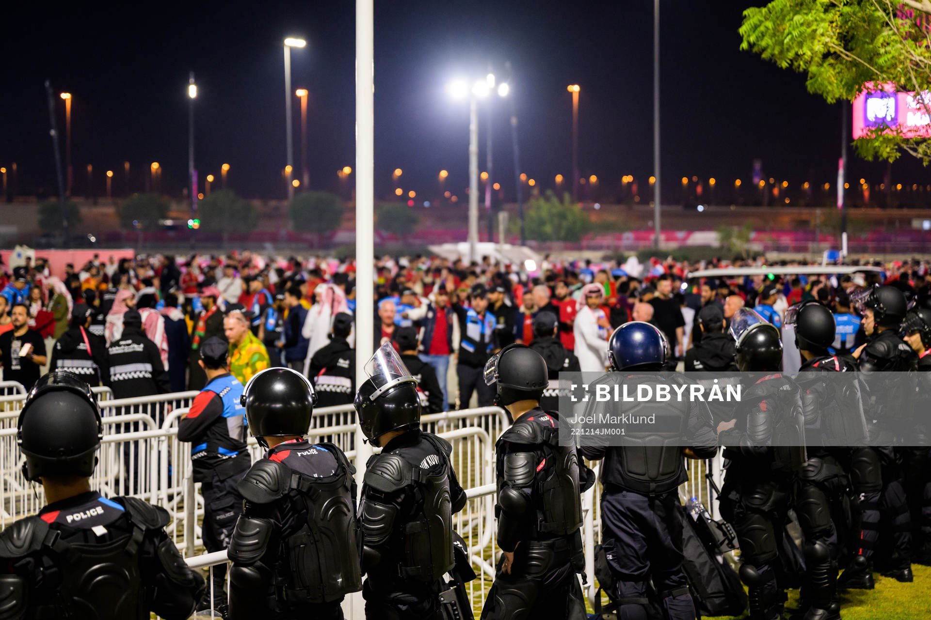 police with riot gear outside of the stadium