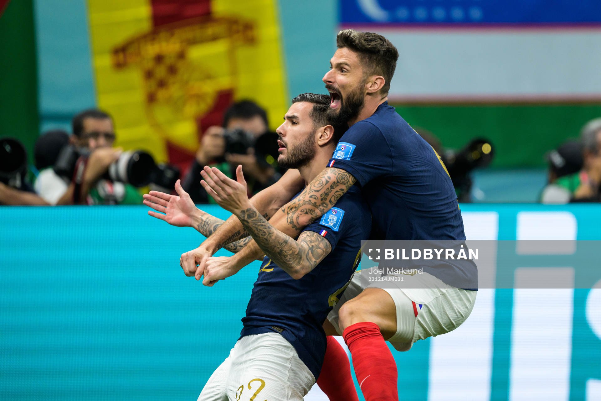 Theo Hernandez and Olivier Giroud of France celebrate