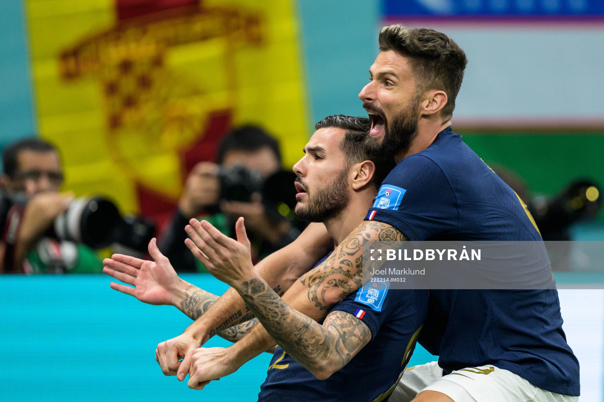 Theo Hernandez and Olivier Giroud of France celebrate