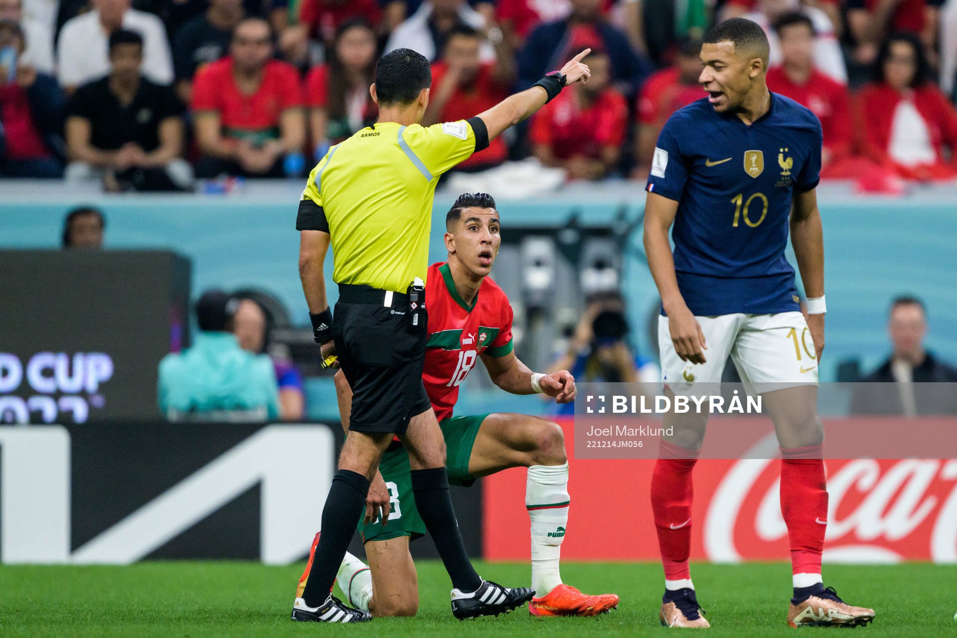 Jawad El Yamiq of Morocco in a discussion with Kylian