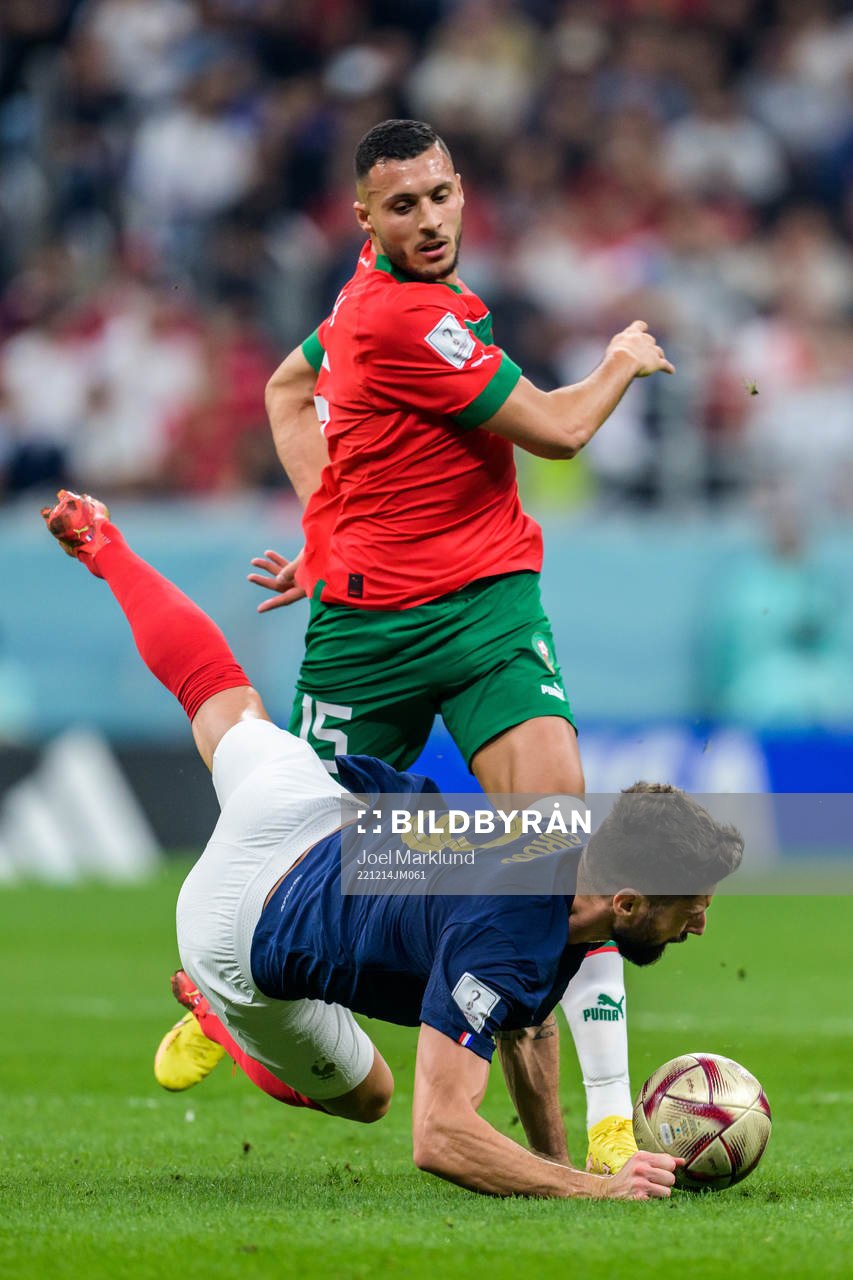 Selim Amallah of Morocco and Olivier Giroud of France