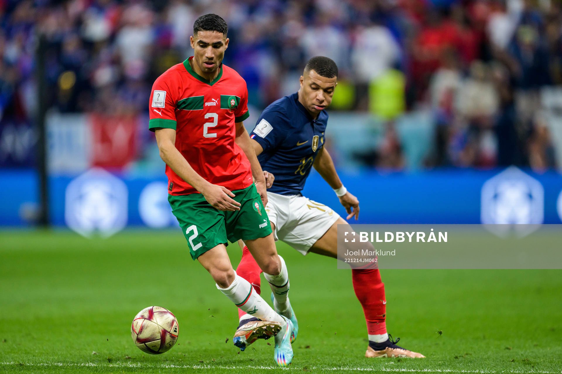 Achraf Hakimi of Morocco and Kylian Mbappe of France