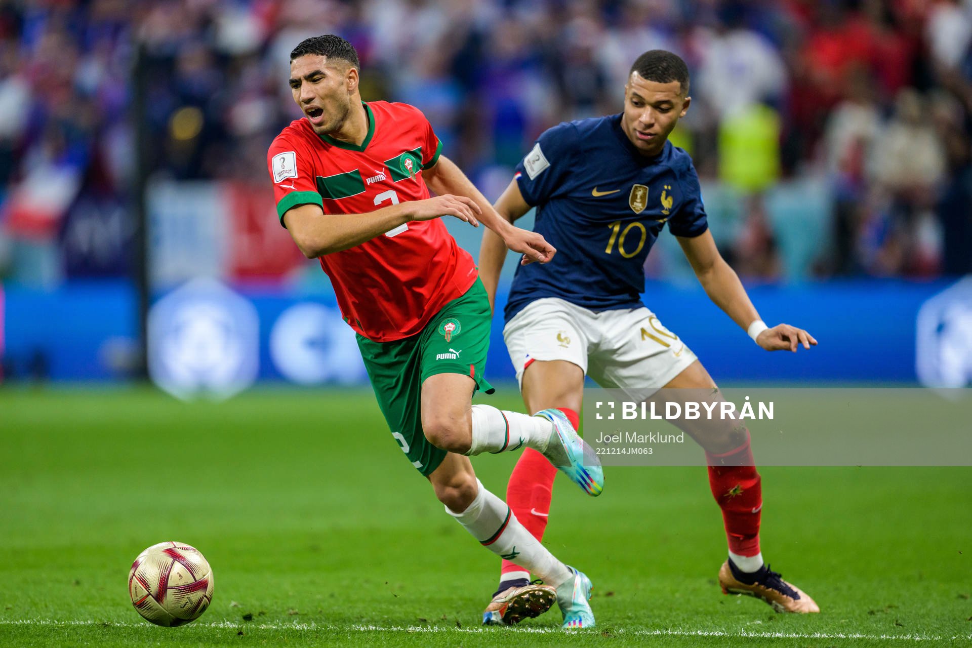 Achraf Hakimi of Morocco and Kylian Mbappe of France