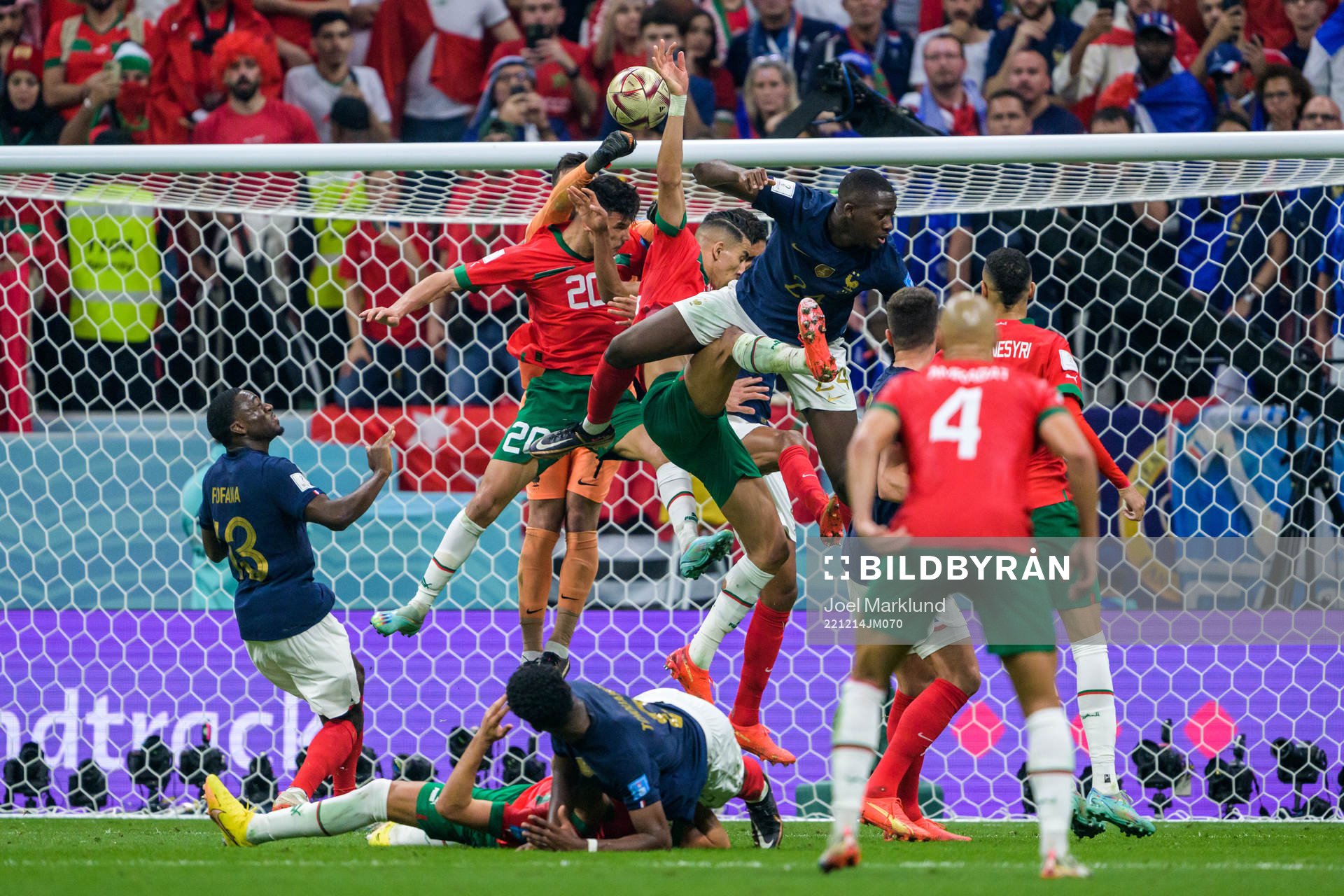 goalkeeper Hugo Lloris of France against Achraf Dari of