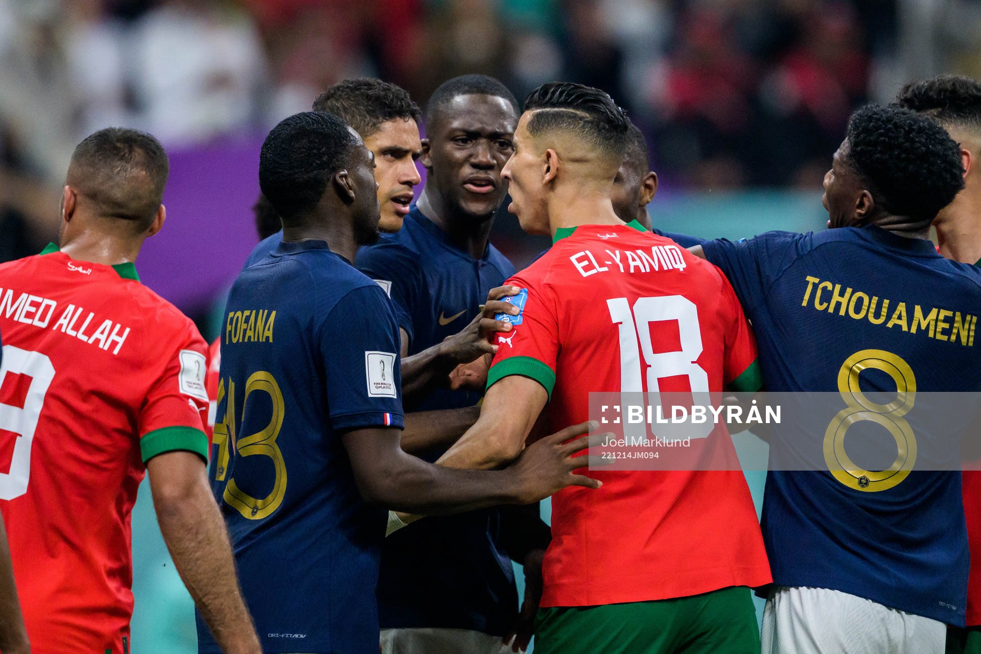 Raphael Varane of France and Jawad El Yamiq of Morocco in a