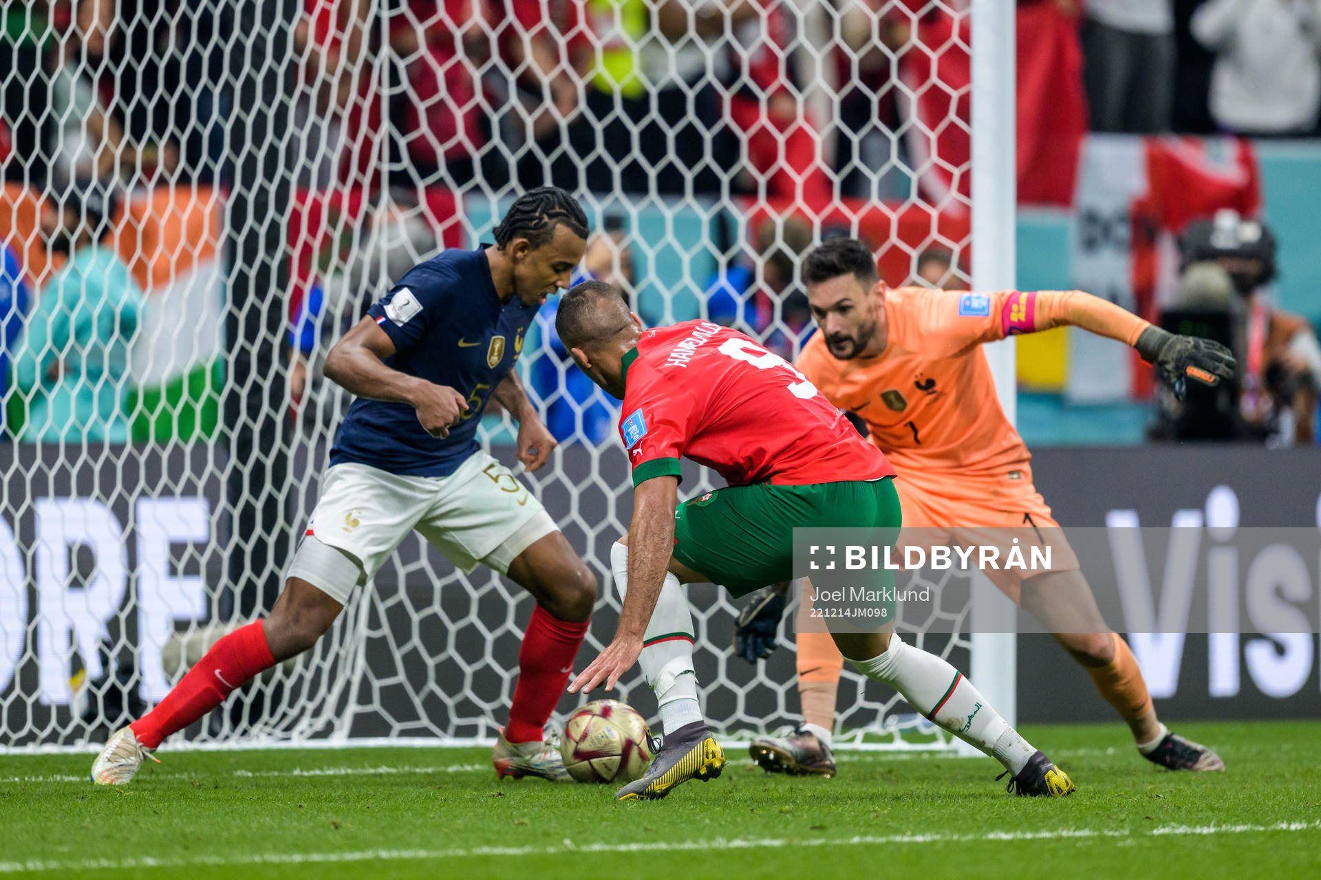 Jules Kounde and goalkeeper Hugo Lloris of France against