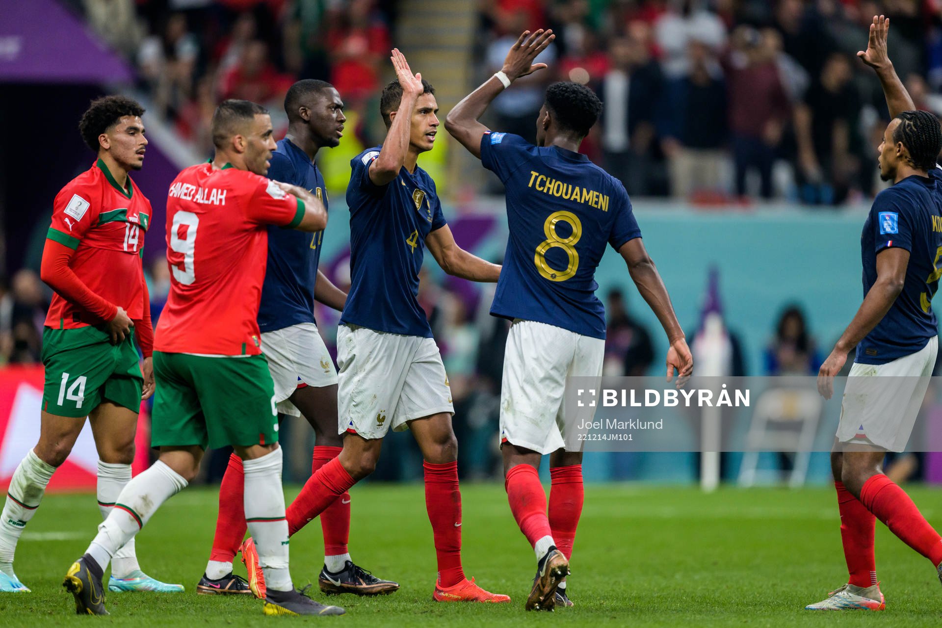 Raphael Varane and Aurelien Tchouameni of France celebrate during the FIFA World Cup 2022 semifinal between France and Morocco on December 14, 2022 in Doha.