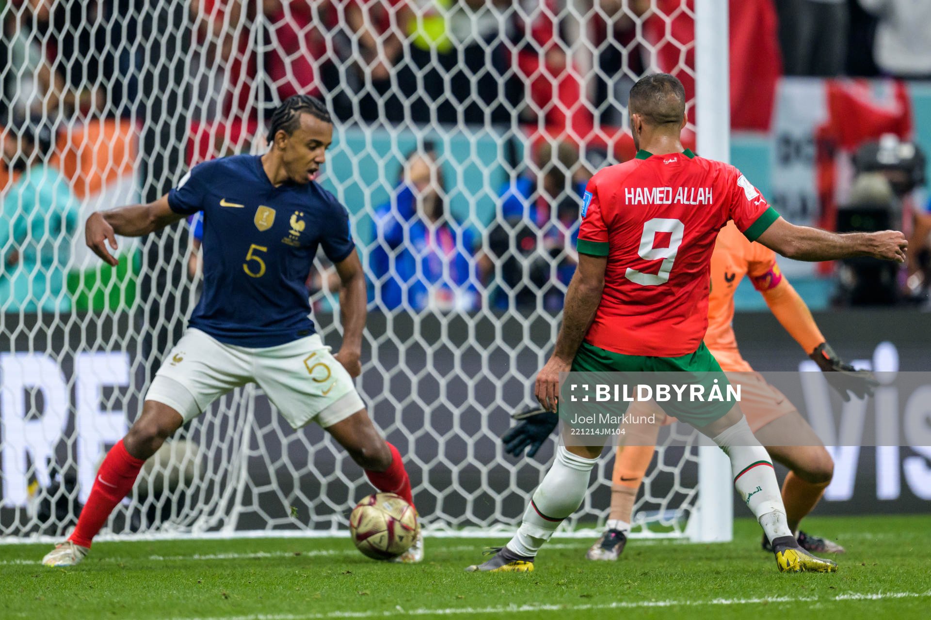 Jules Kounde of France and Abderrazak Hamdallah of Morocco