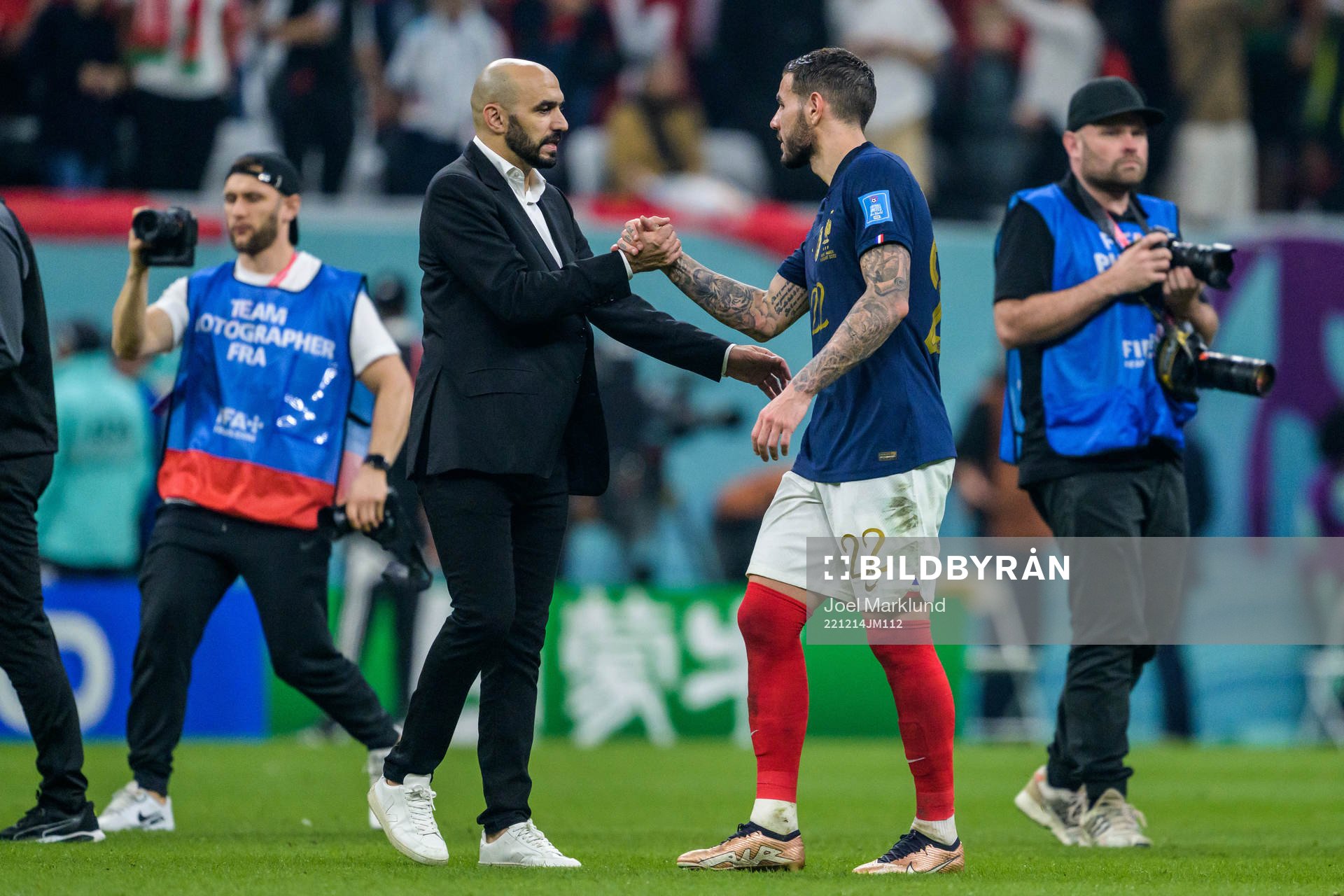 head coach Walid Regragui of Morocco and Theo Hernandez of