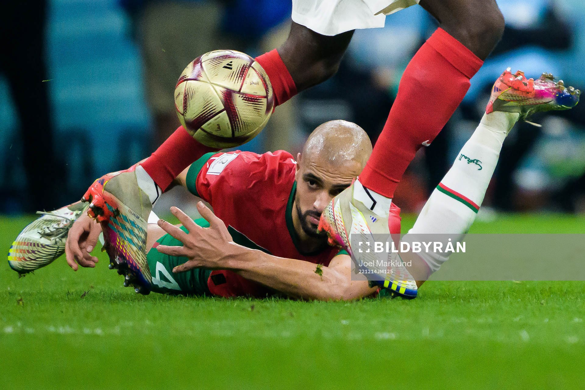 Sofyan Amrabat of Morocco reaches for the ball between the