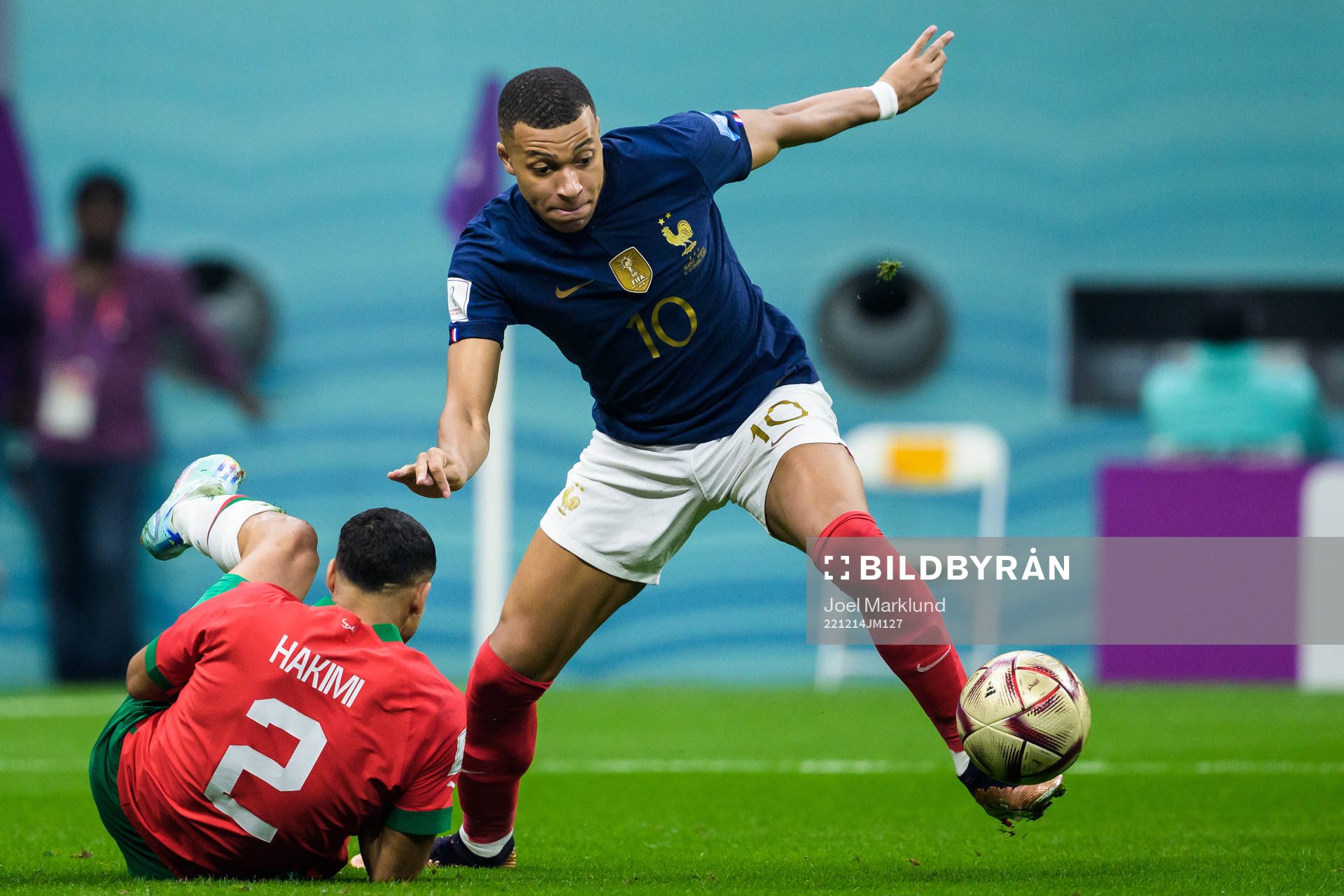 Achraf Hakimi of Morocco and Kylian Mbappe of France
