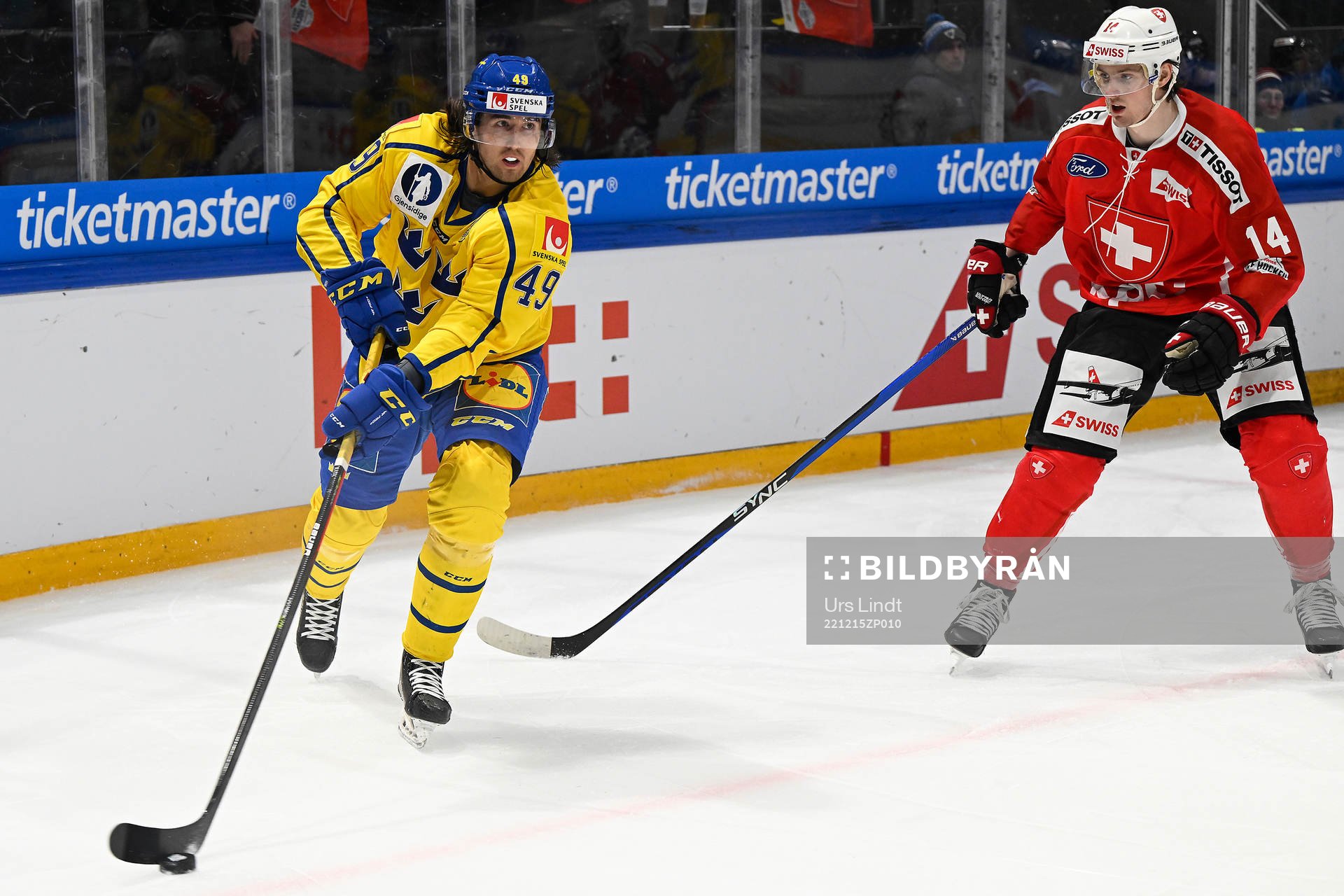 Victor Rask of Sweden and Dean Kukan of Switzerland