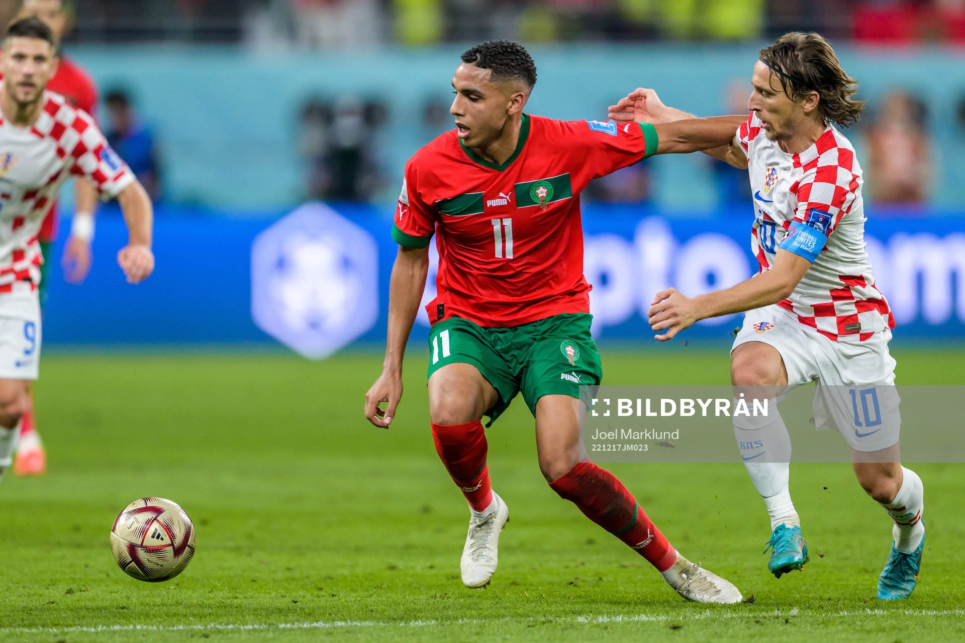Abdelhamid Sabiri of Morocco and Luka Modric of Croatia