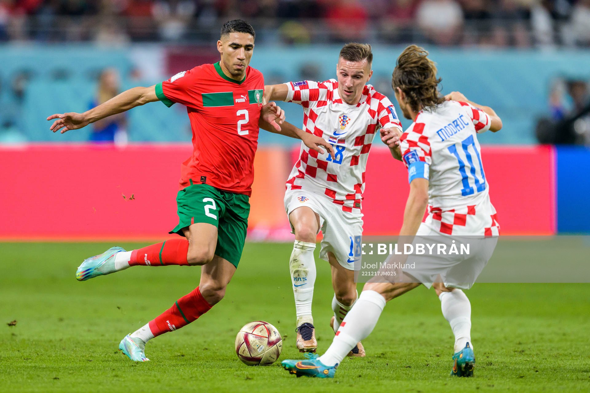Achraf Hakimi of Morocco against Mislav Orsic and Luka