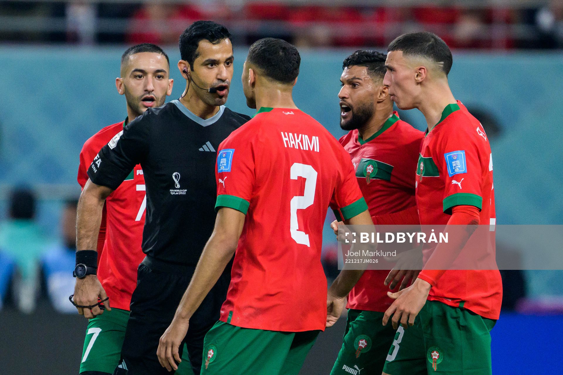 Referee Abdulrahman Al Jassim in a discussion with Achraf