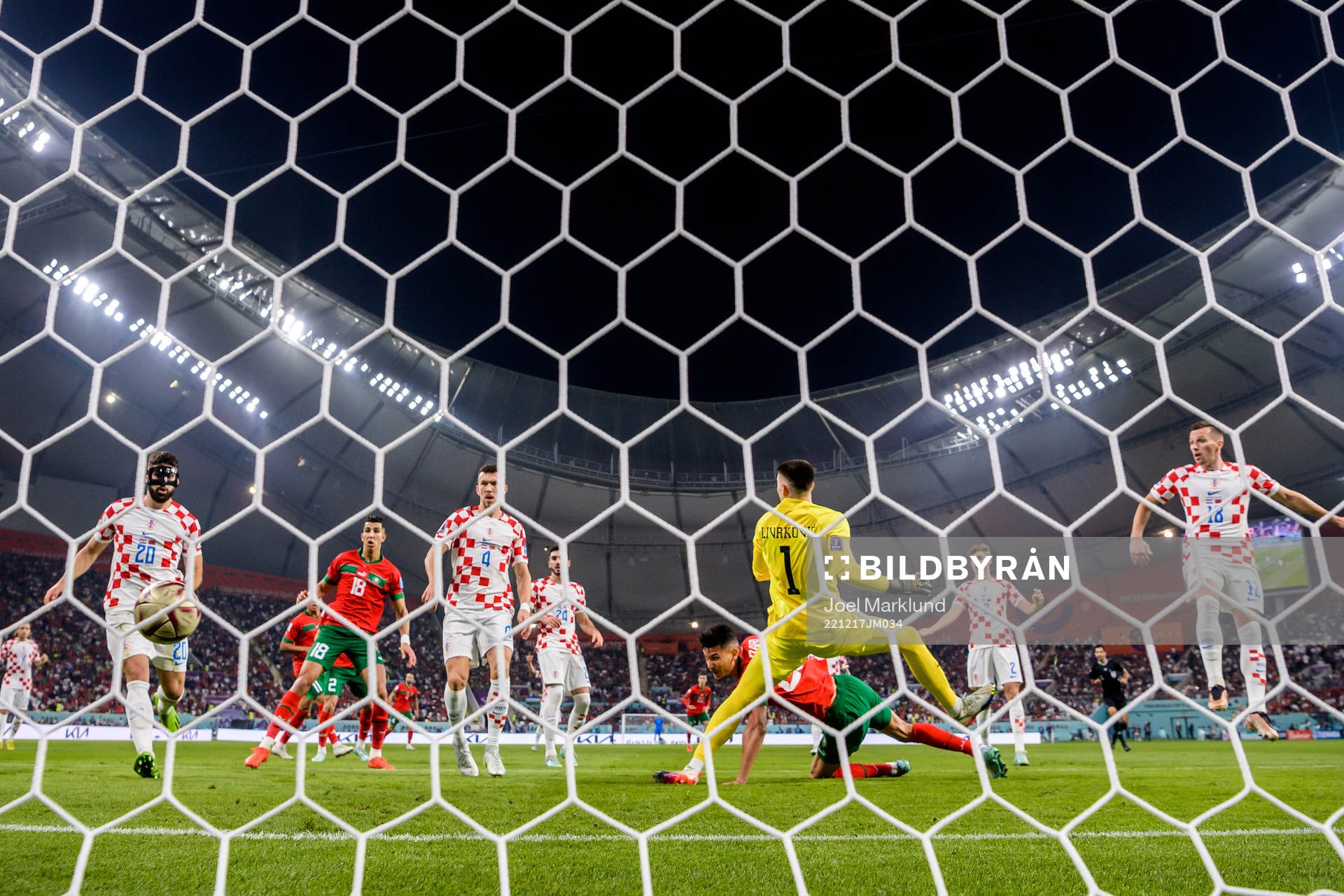 Achraf Dari of Morocco scores 1-1