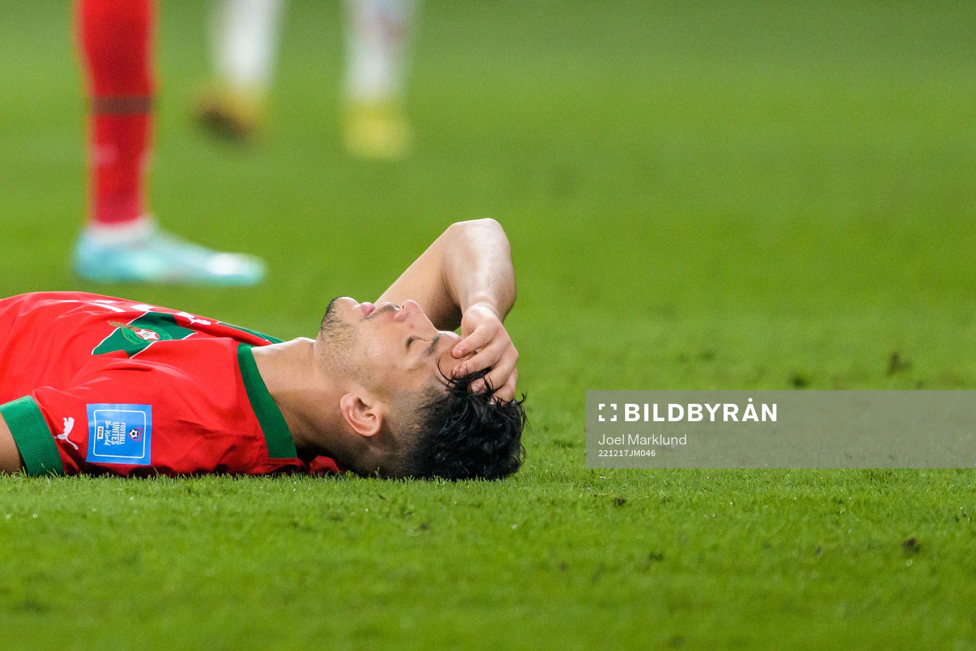 Achraf Dari of Morocco in pain