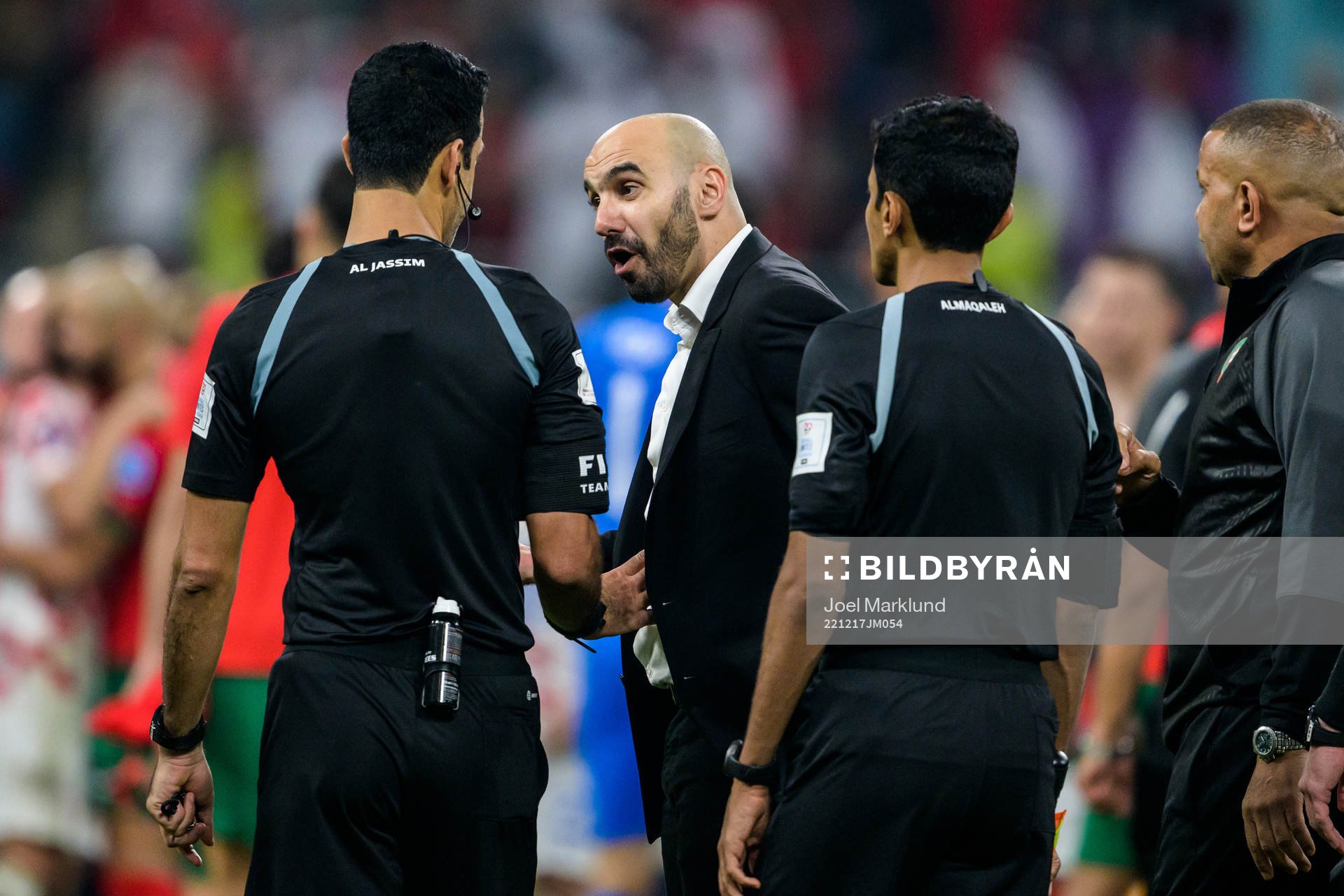head coach Walid Regragui of Morocco and Referee
