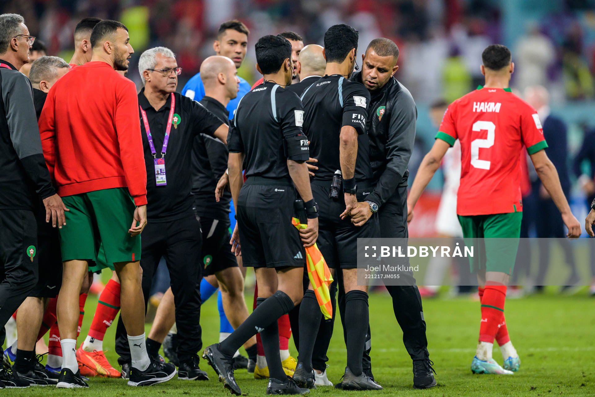 A staff member of Morocco obstructs Referee Abdulrahman Al