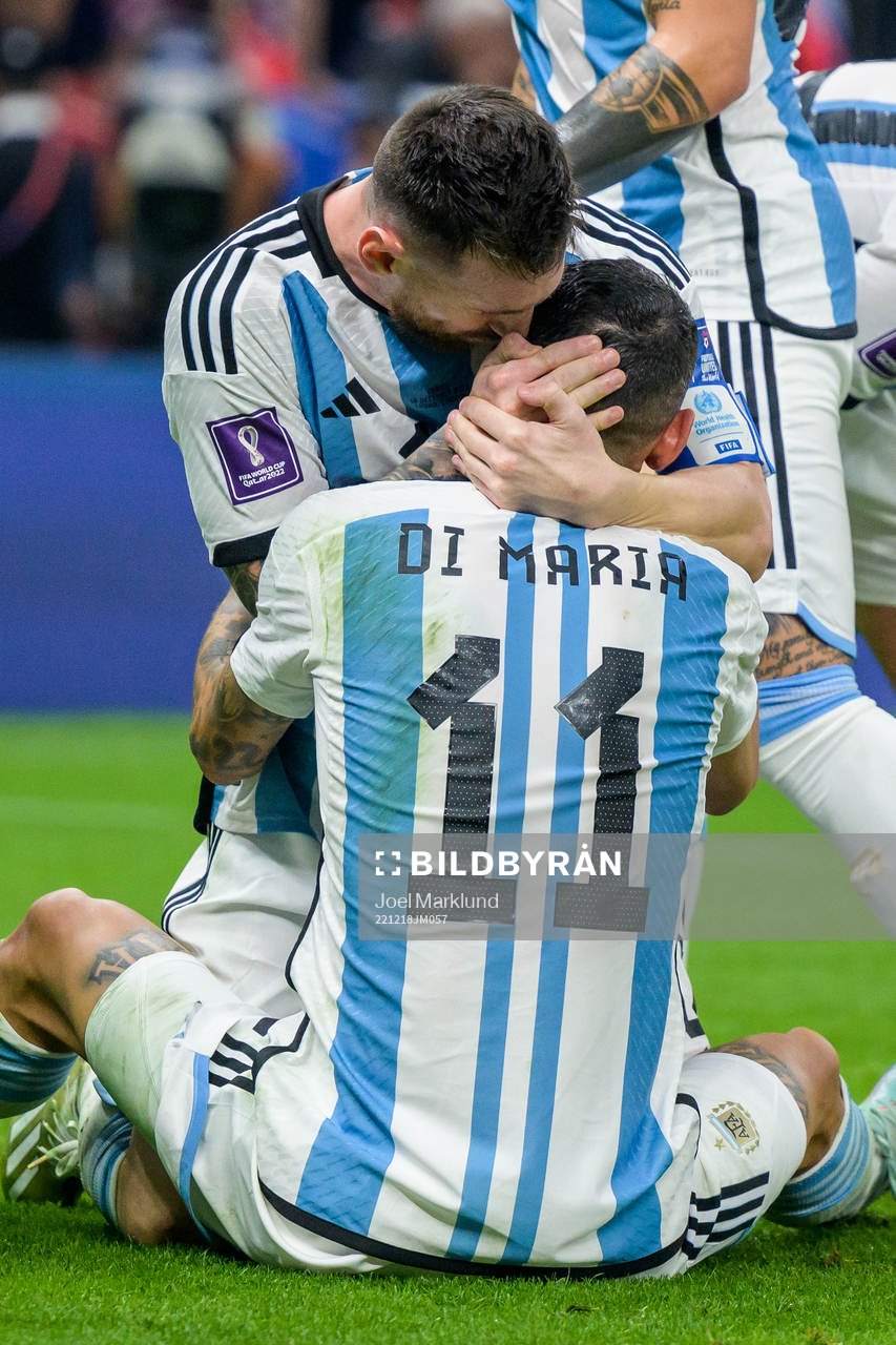 Angel de Maria and Lionel Messi of Argentina celebrate