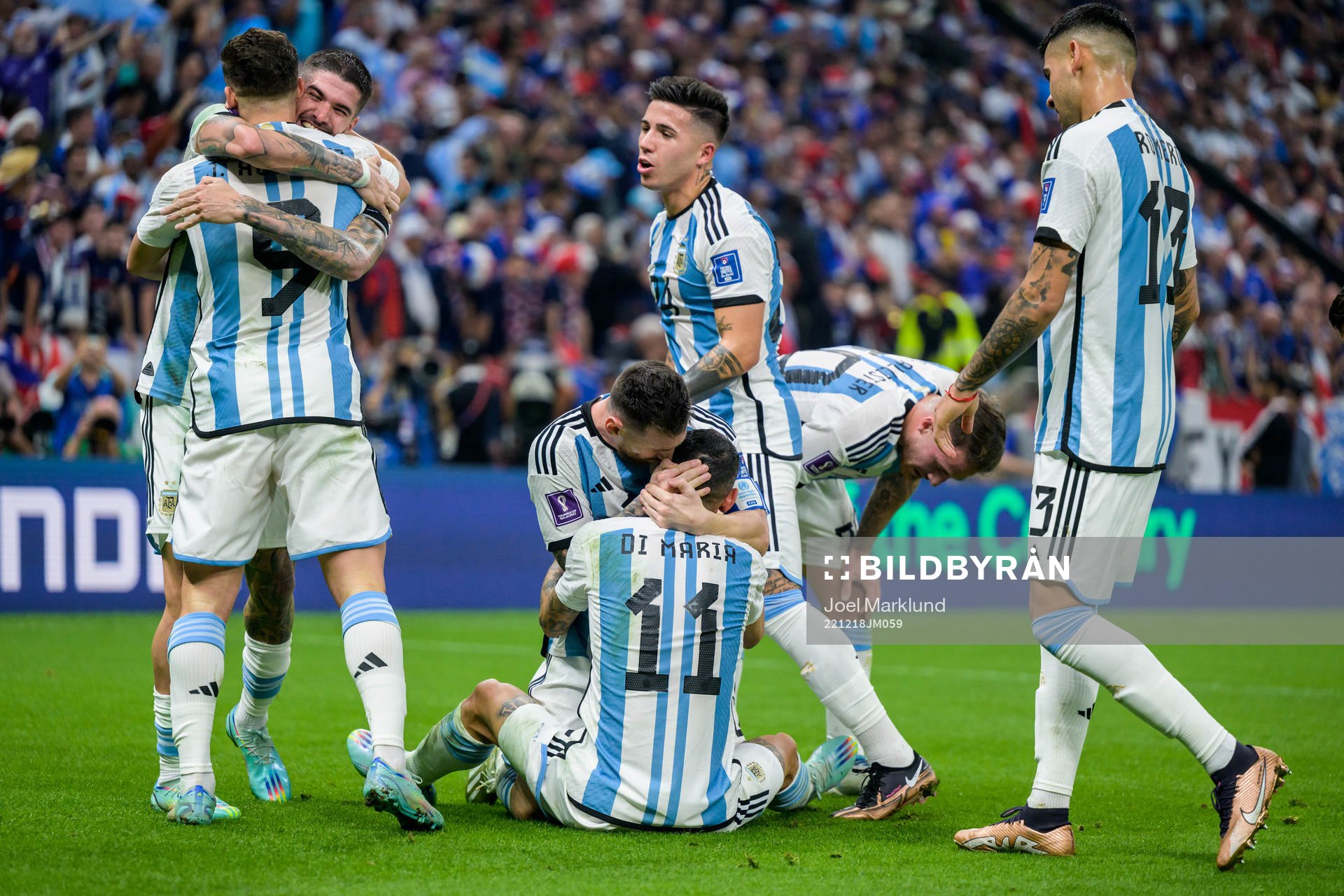 Angel de Maria and Lionel Messi of Argentina celebrate
