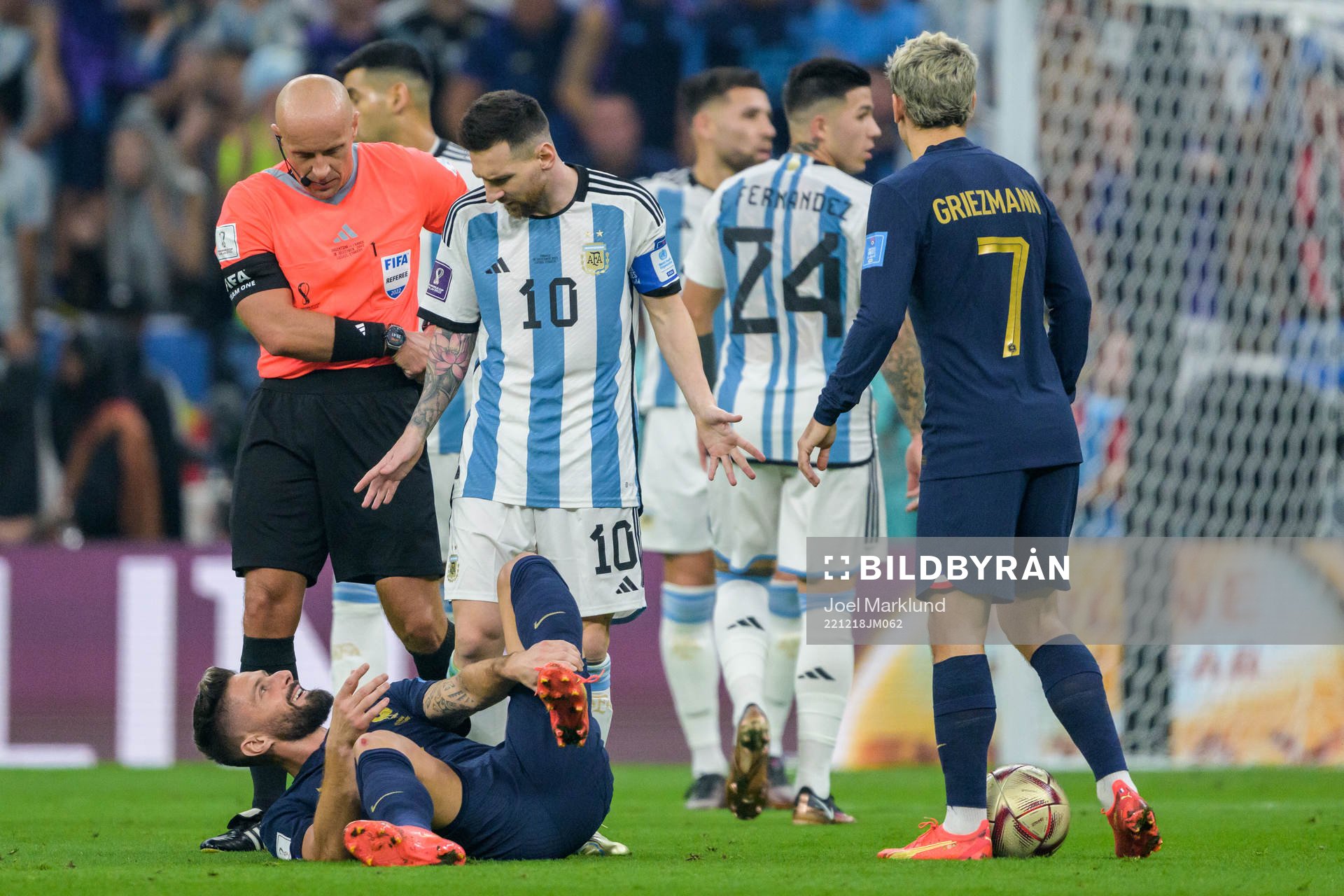 Olivier Giroud of France and Lionel Messi of Argentina