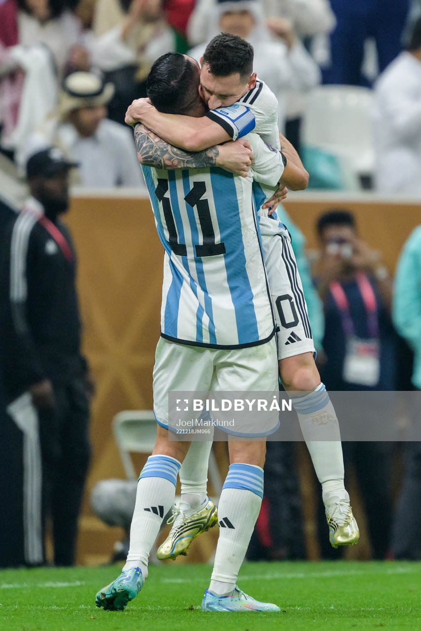 Angel de Maria and Lionel Messi of Argentina celebrate