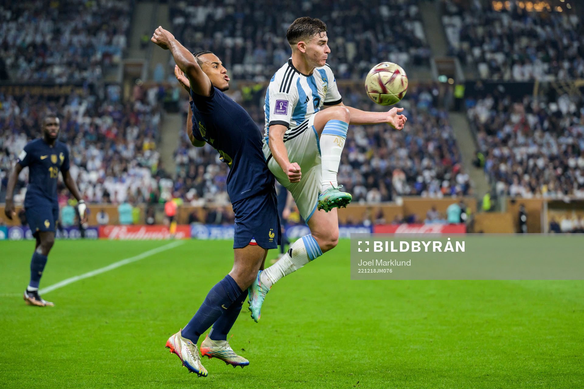 Jules Kounde of France and Julian Alvarez of Argentina
